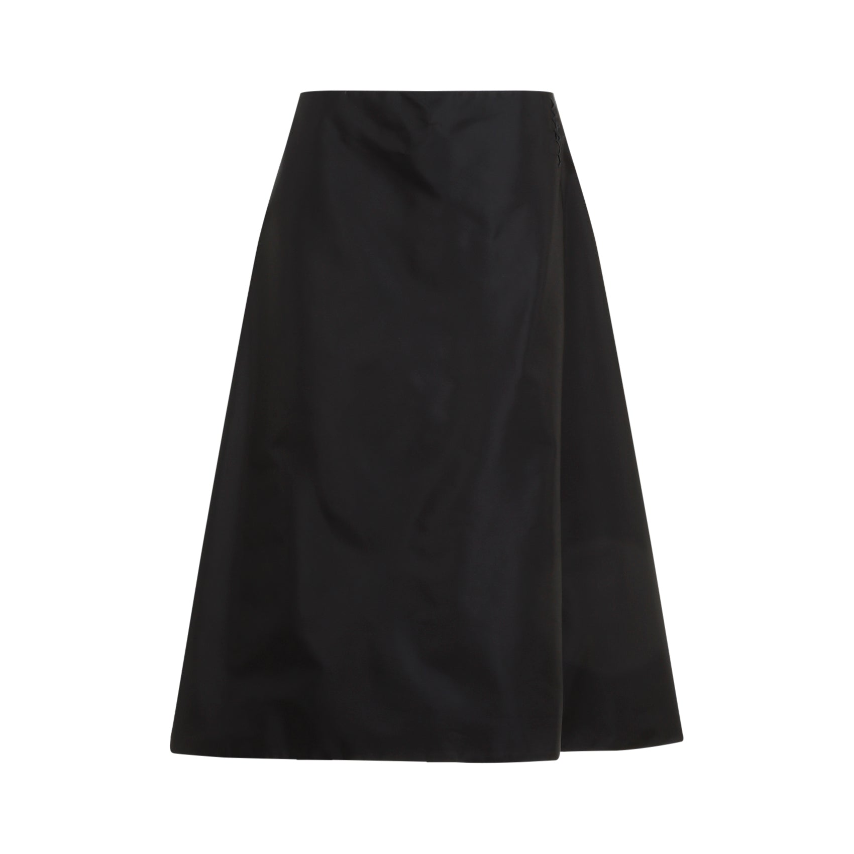 Black Marni midi skirt showing circle design and widened hem, side angle