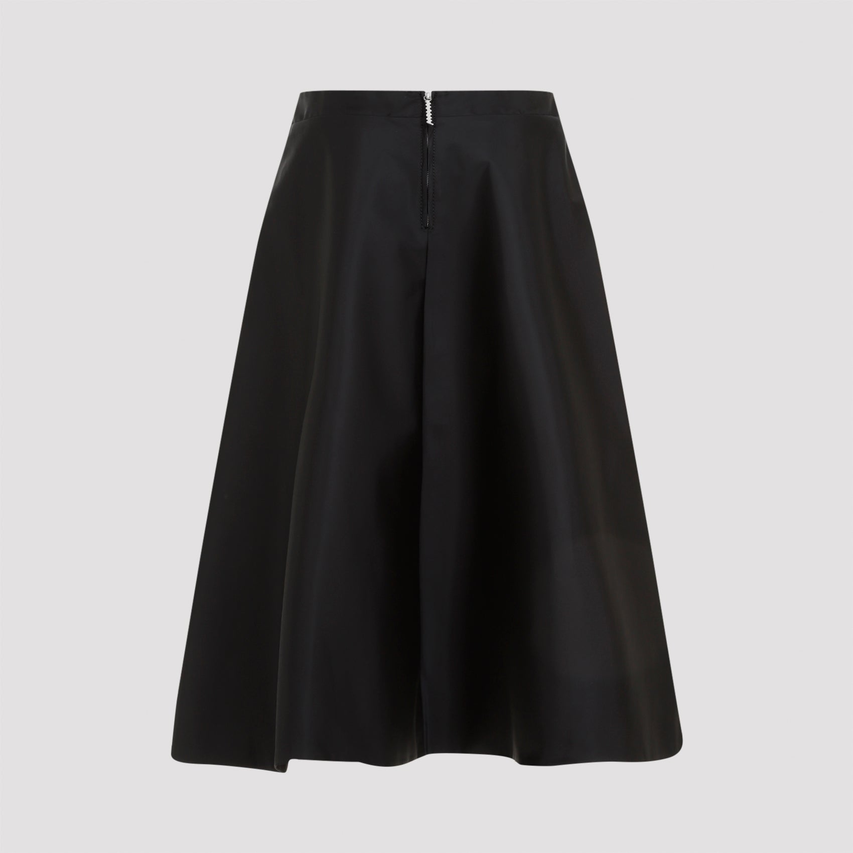 Black Marni midi skirt detail showing tonal embroidered logo at side