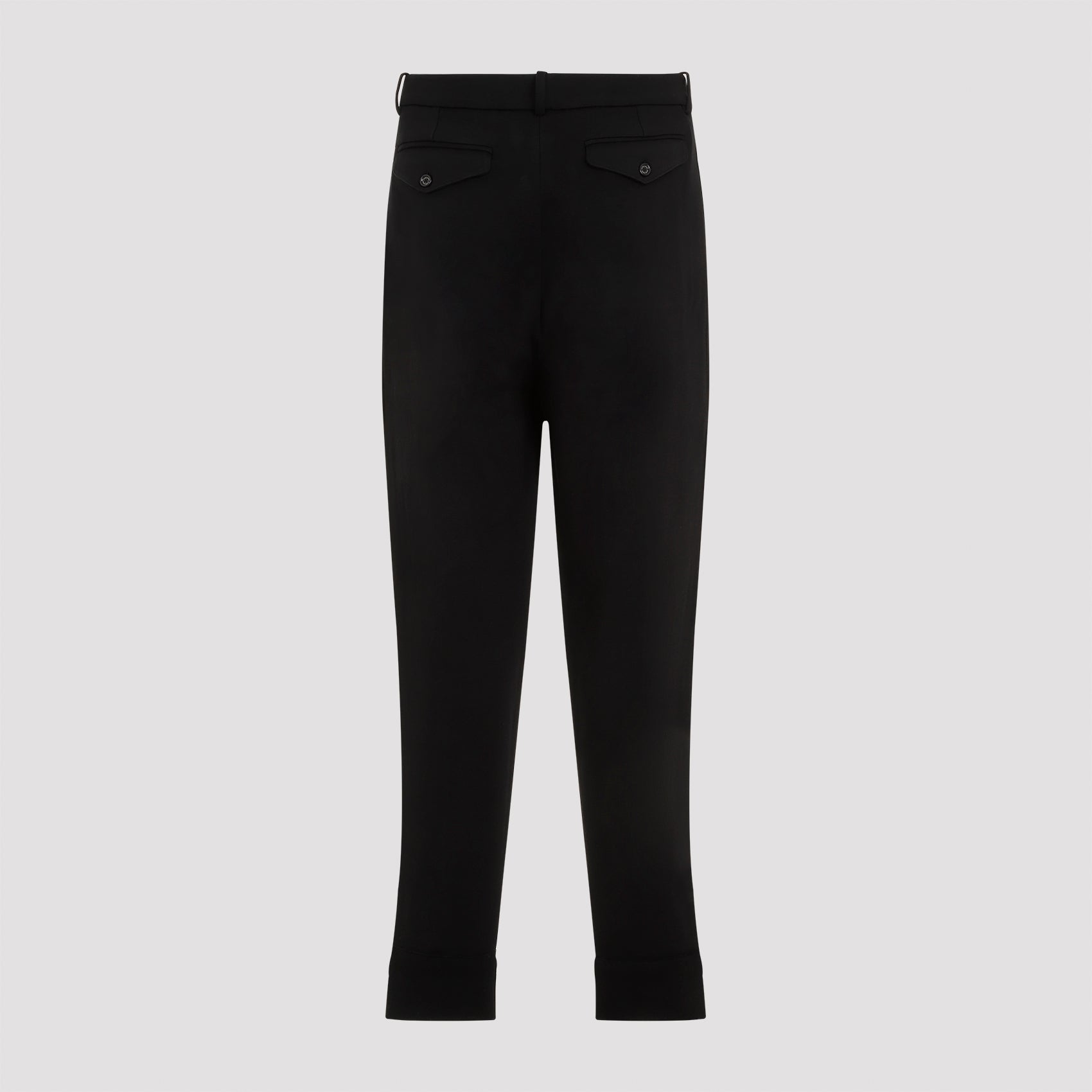 Black wool jogger pants detail of flap pockets by Ralph Lauren Purple Label, close-up