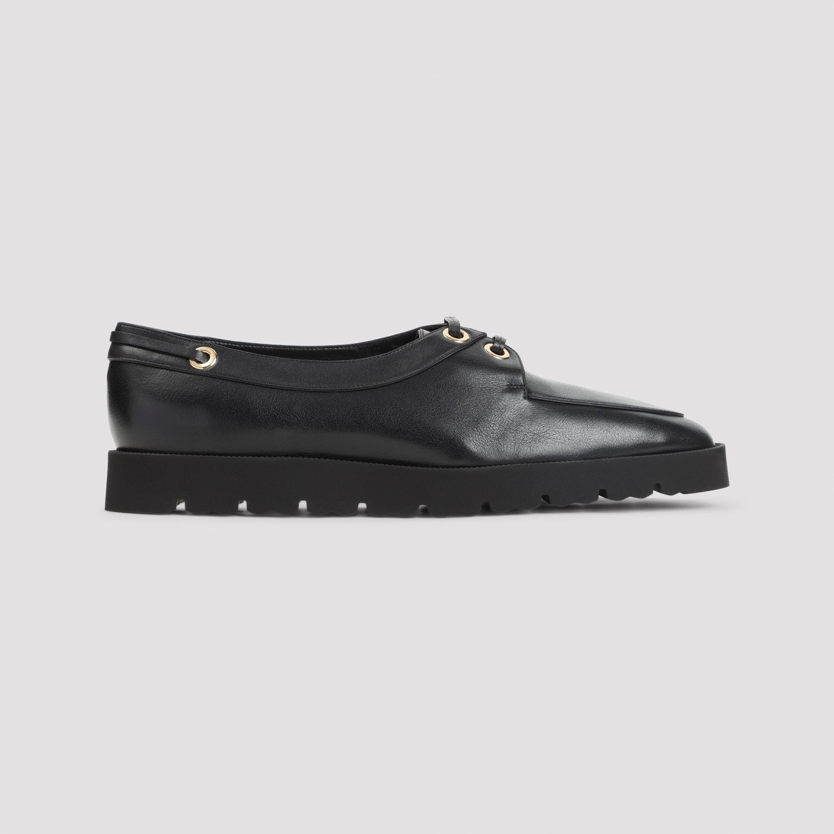 Black Celine chunky loafer showing serrated EVA sole, bottom view by Celine