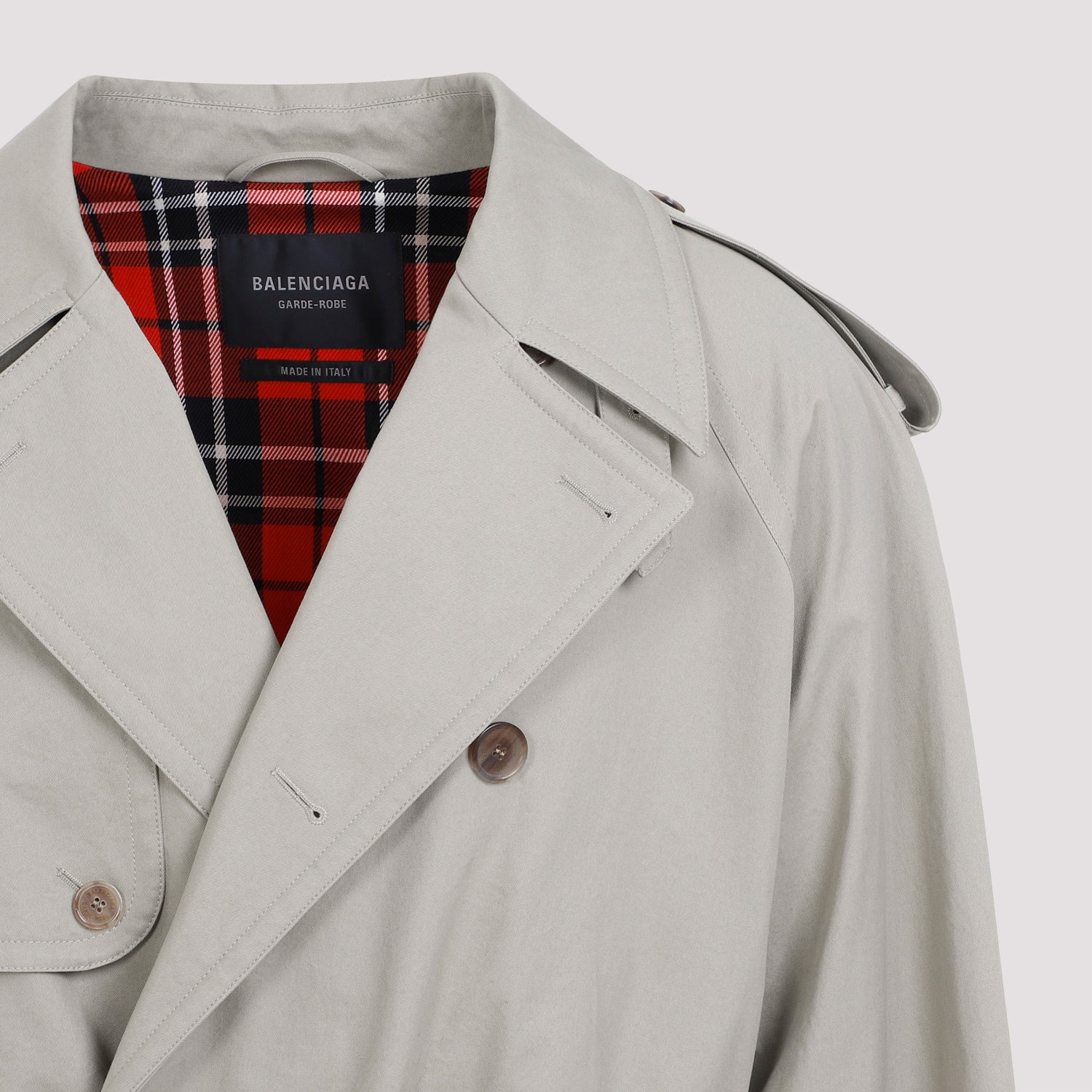 Beige Balenciaga military coat with side flap pockets, close-up by Balenciaga