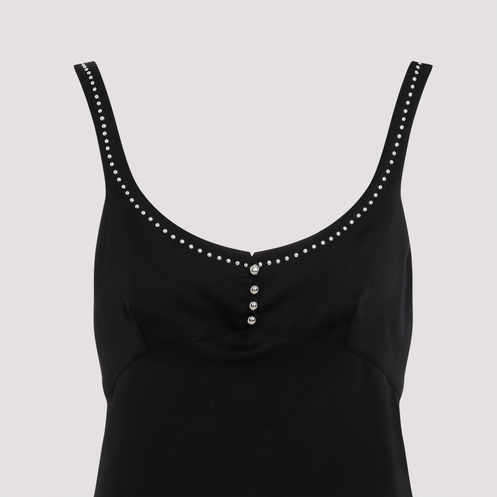 Black Rabanne mini dress showing silver-tone studded trim detail by Rabanne