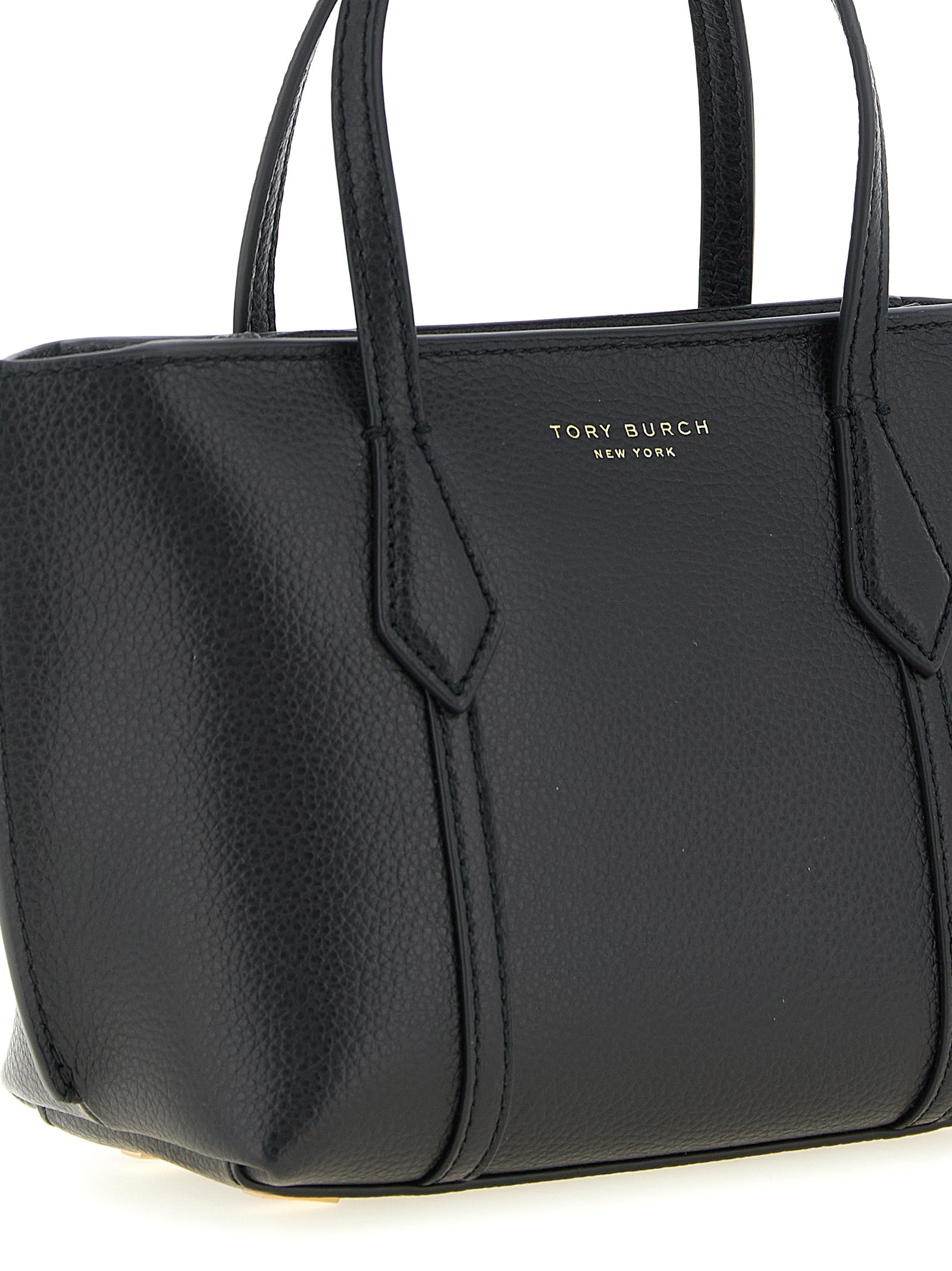 Black leather Perry handbag showing adjustable shoulder strap by Tory Burch