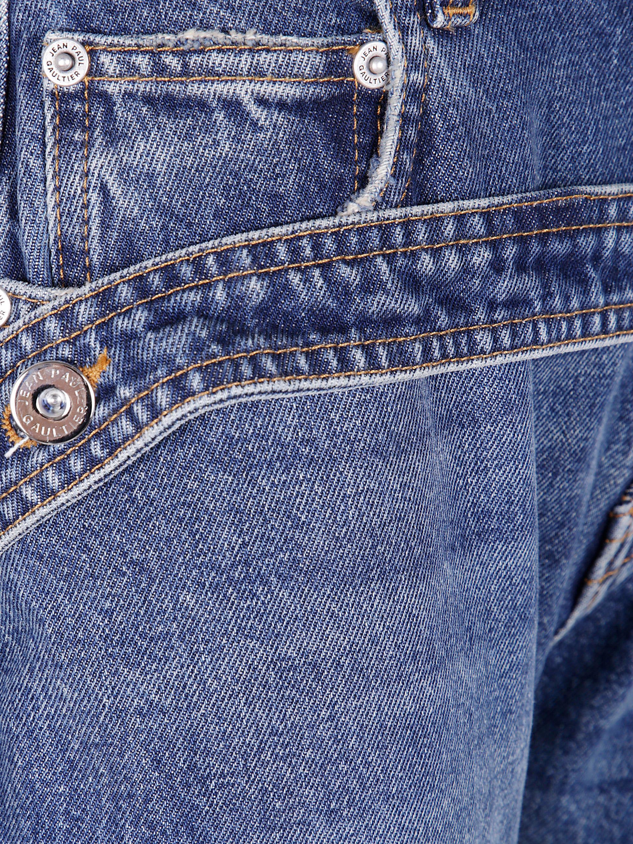 LOW WAISTED JEAN WITH STRAP DETAIL ON THE FRONT JEAN PAUL GAULTIER