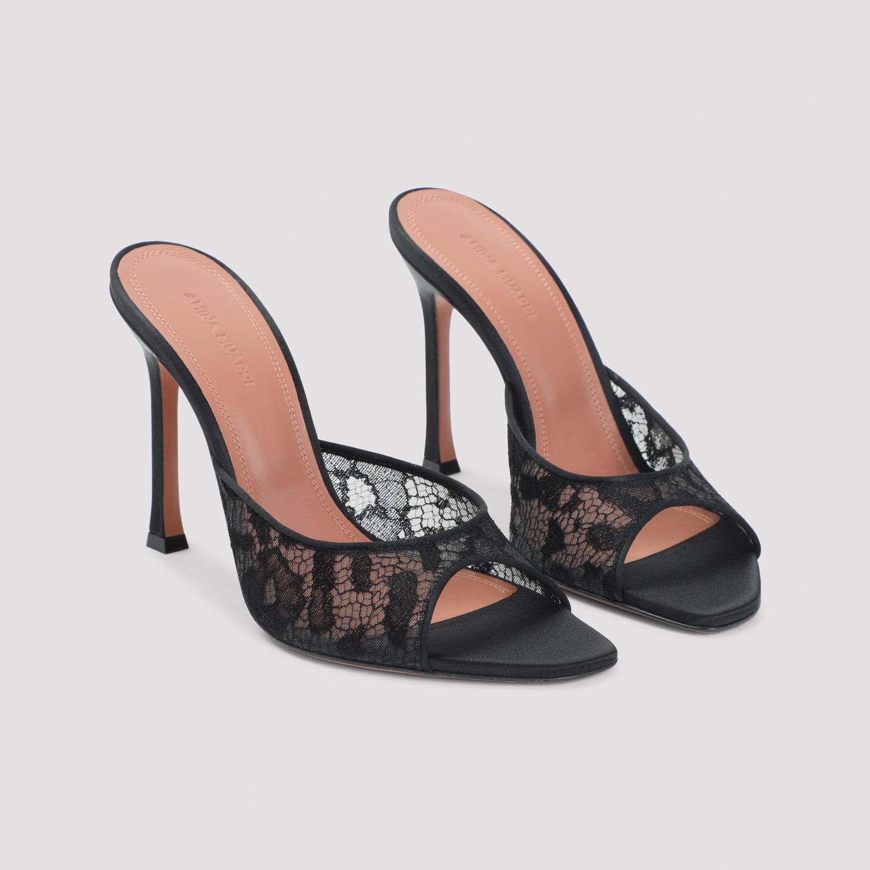 Black lace Alexa slipper by Amina Muaddi, interior leather insole detail