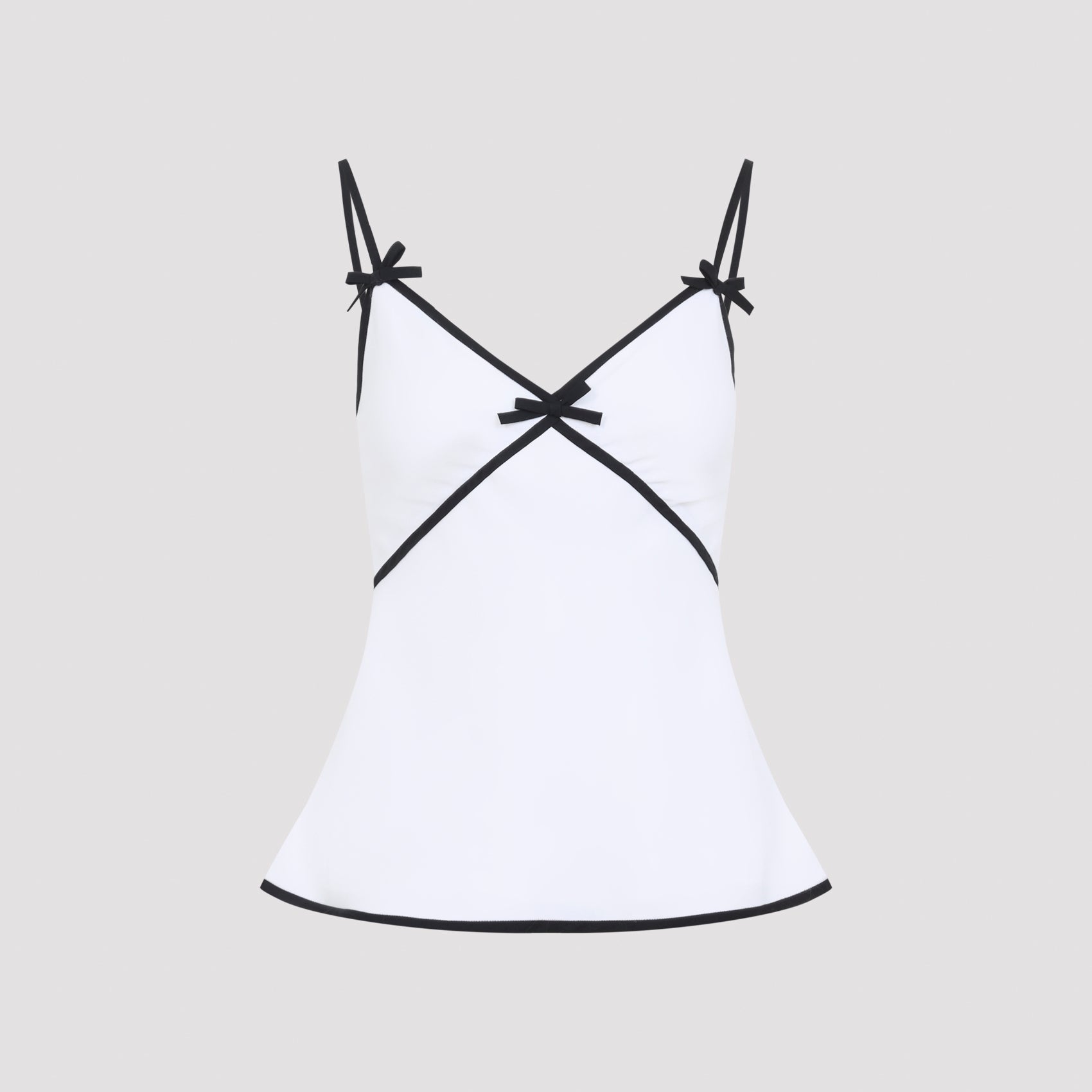 White Moschino sleeveless top with bow details, front view