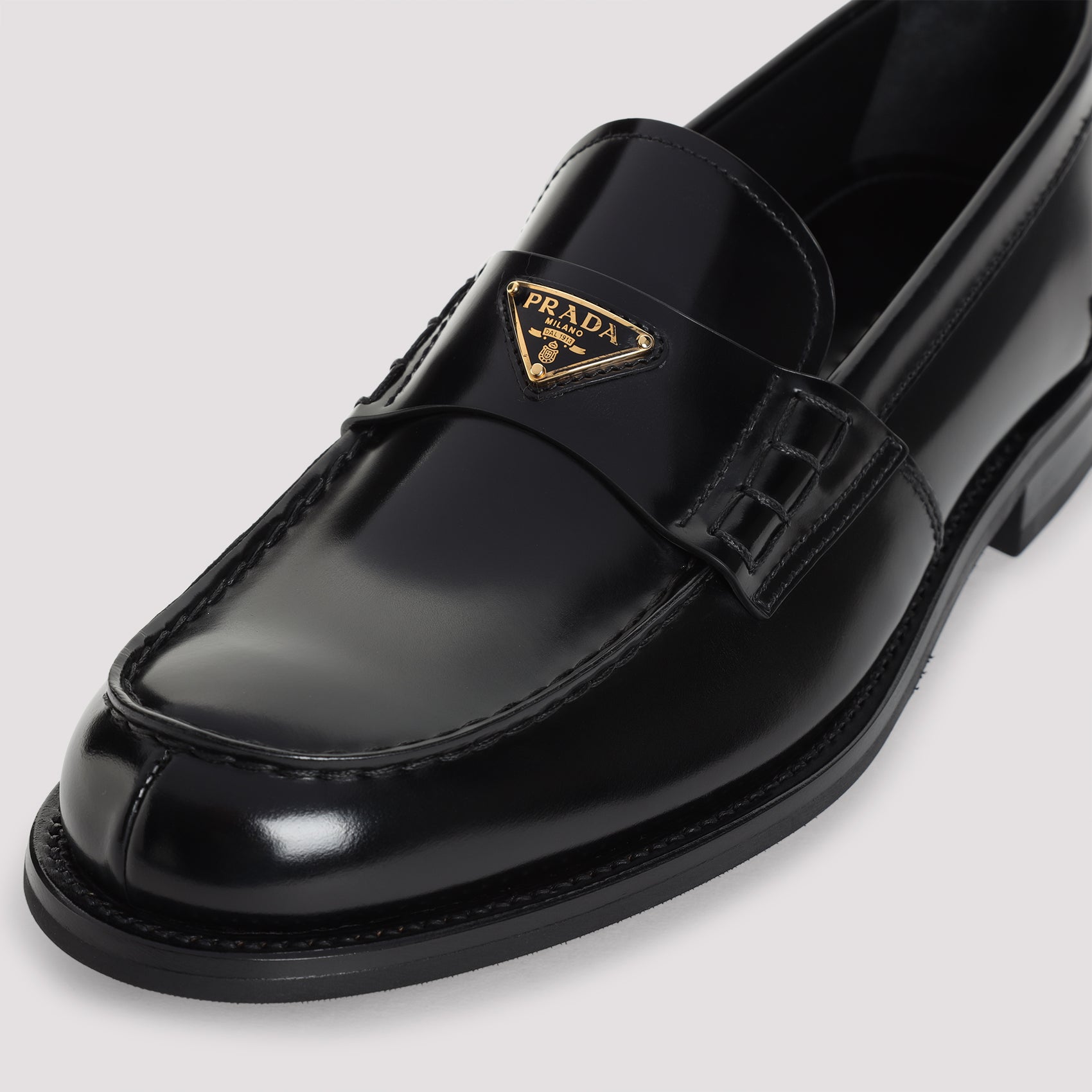 BRUSHED LEATHER LOAFERS Prada