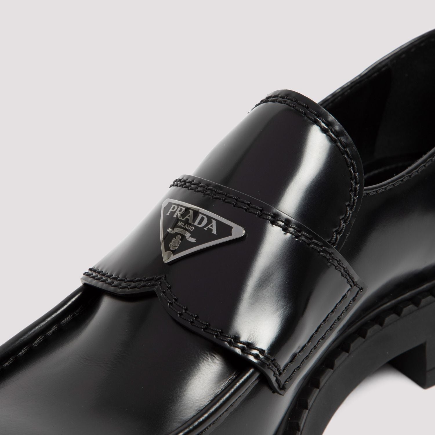 BLACK LEATHER CHOCOLATE LOAFERS Prada