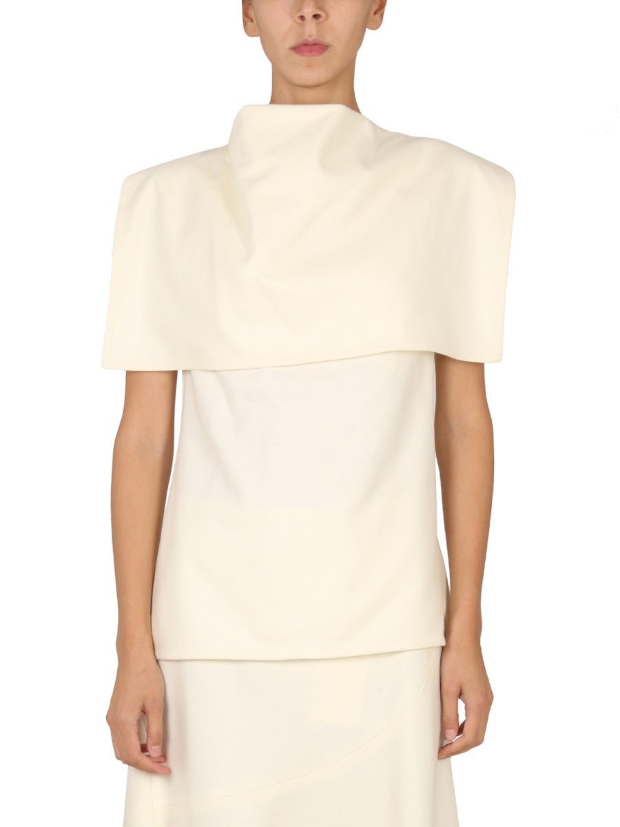 White Jil Sander wool top with round shoulder detail, front view
