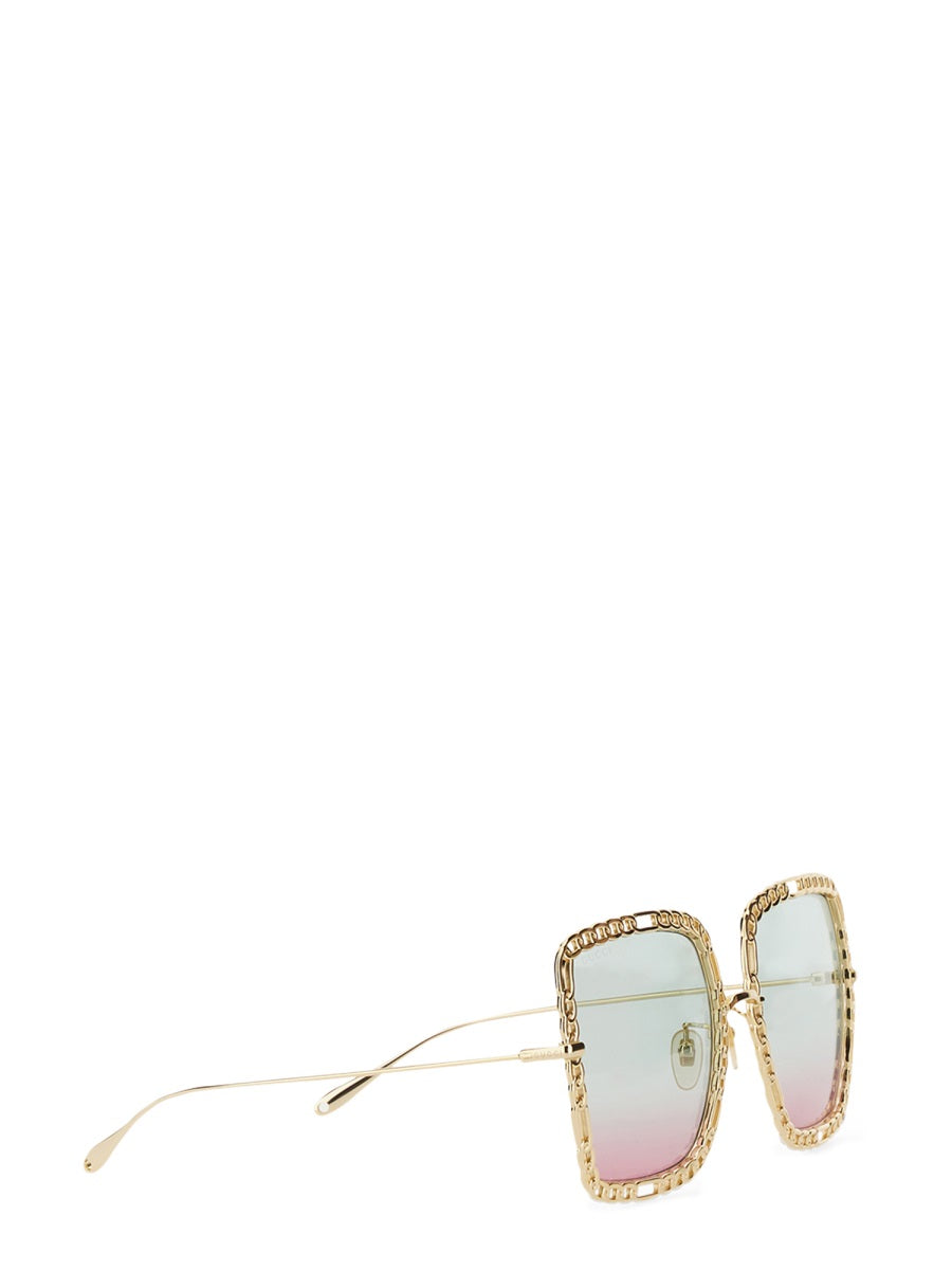OCCHIALE DA SOLE RETTANGOLARE CON CATENA Gucci