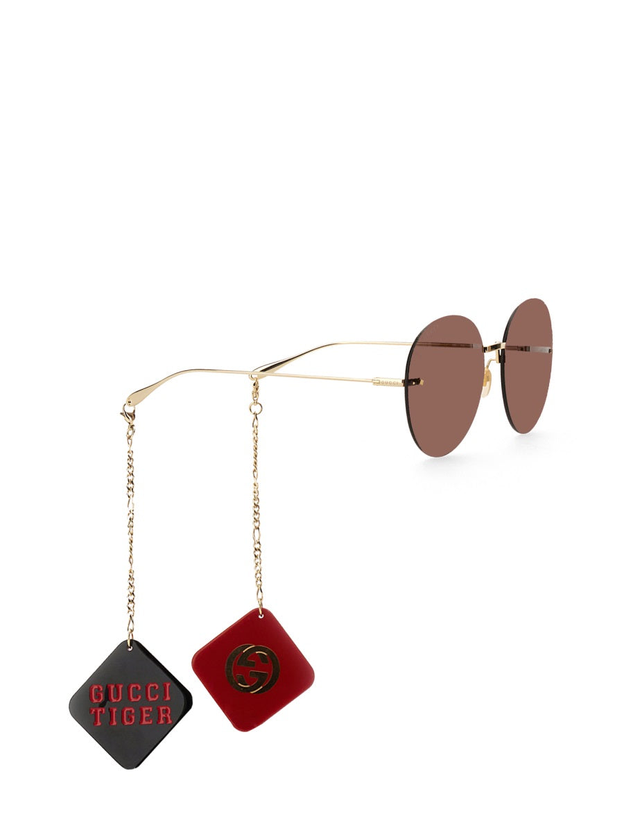 TIGER GLASSES WITH PENDANT Gucci