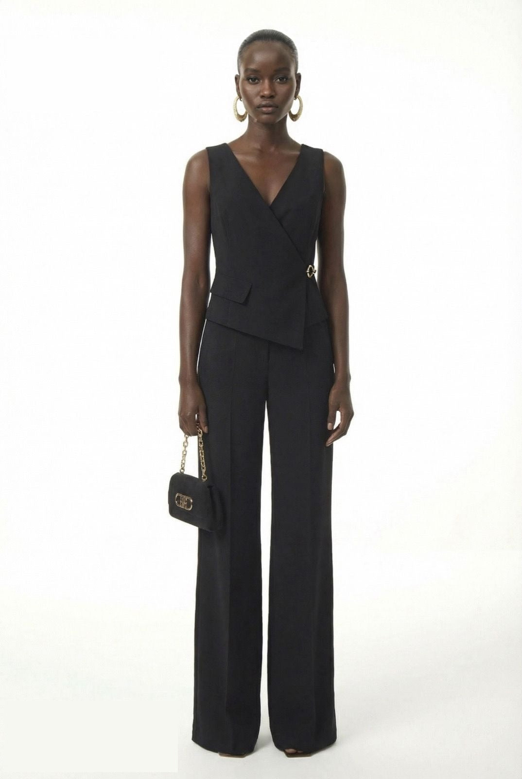 Black sleeveless jumpsuit with pressed center crease by Lord & Taylor Heritage, product view
