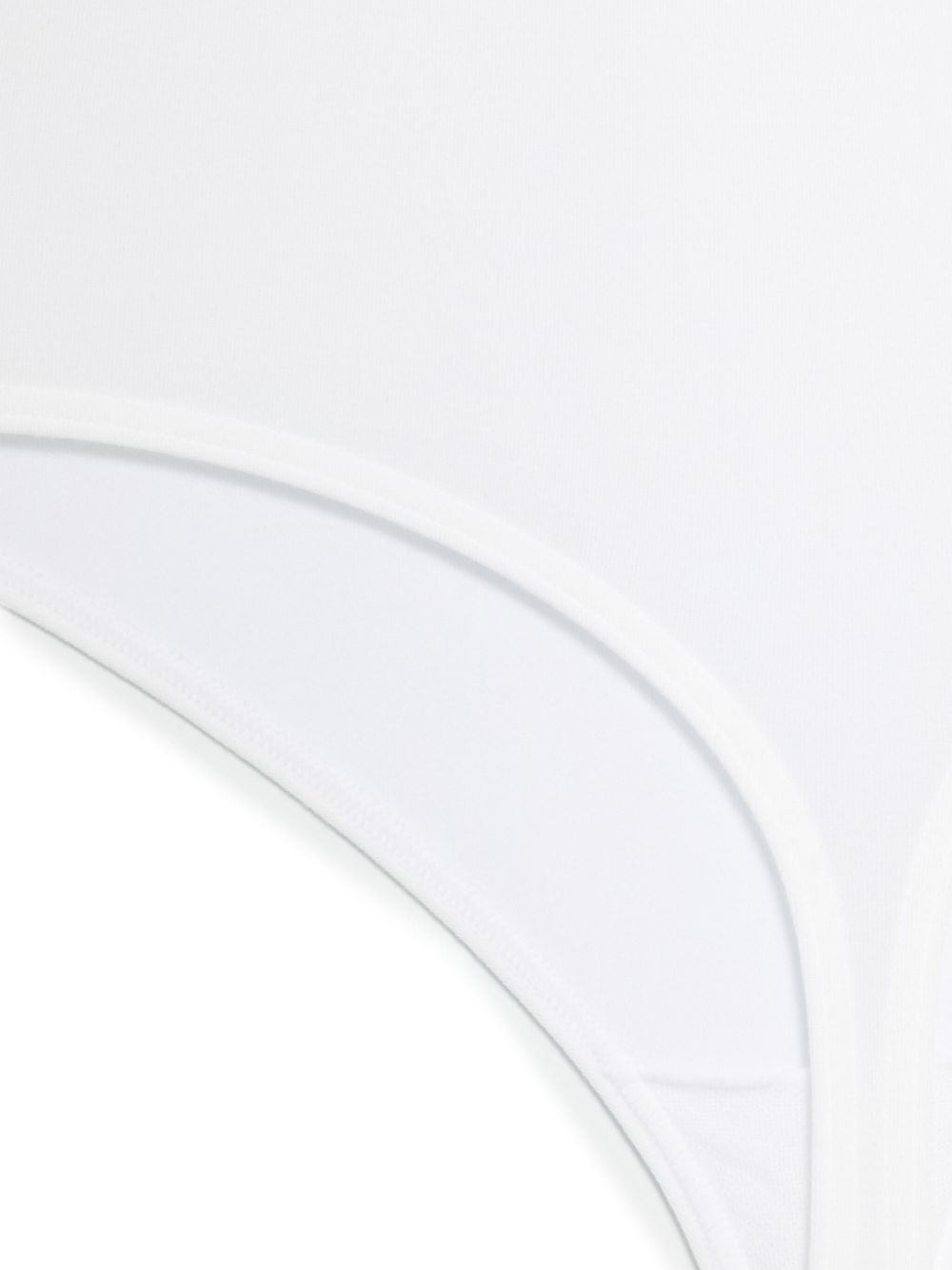White Wolford sleeveless bodysuit detail, high-cut leg opening
