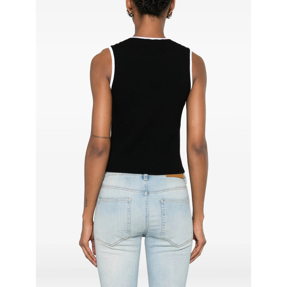 Black AMIRI sleeveless crop top, detail view of crew neckline