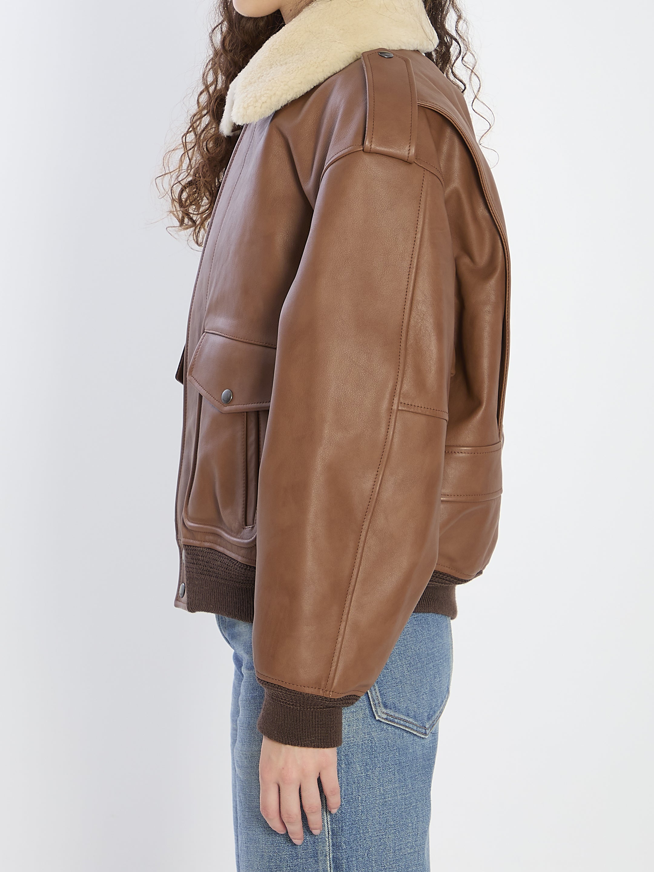 BOMBER JACKET IN HAMMERED LEATHER AND SHEARLING Saint Laurent
