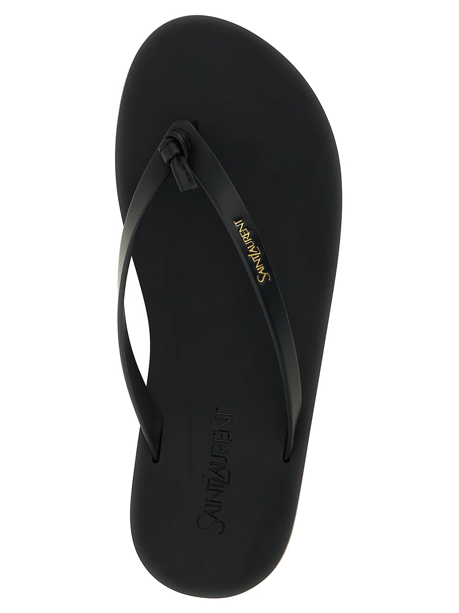 Black leather Pool flip flops by Saint Laurent, sole detail view