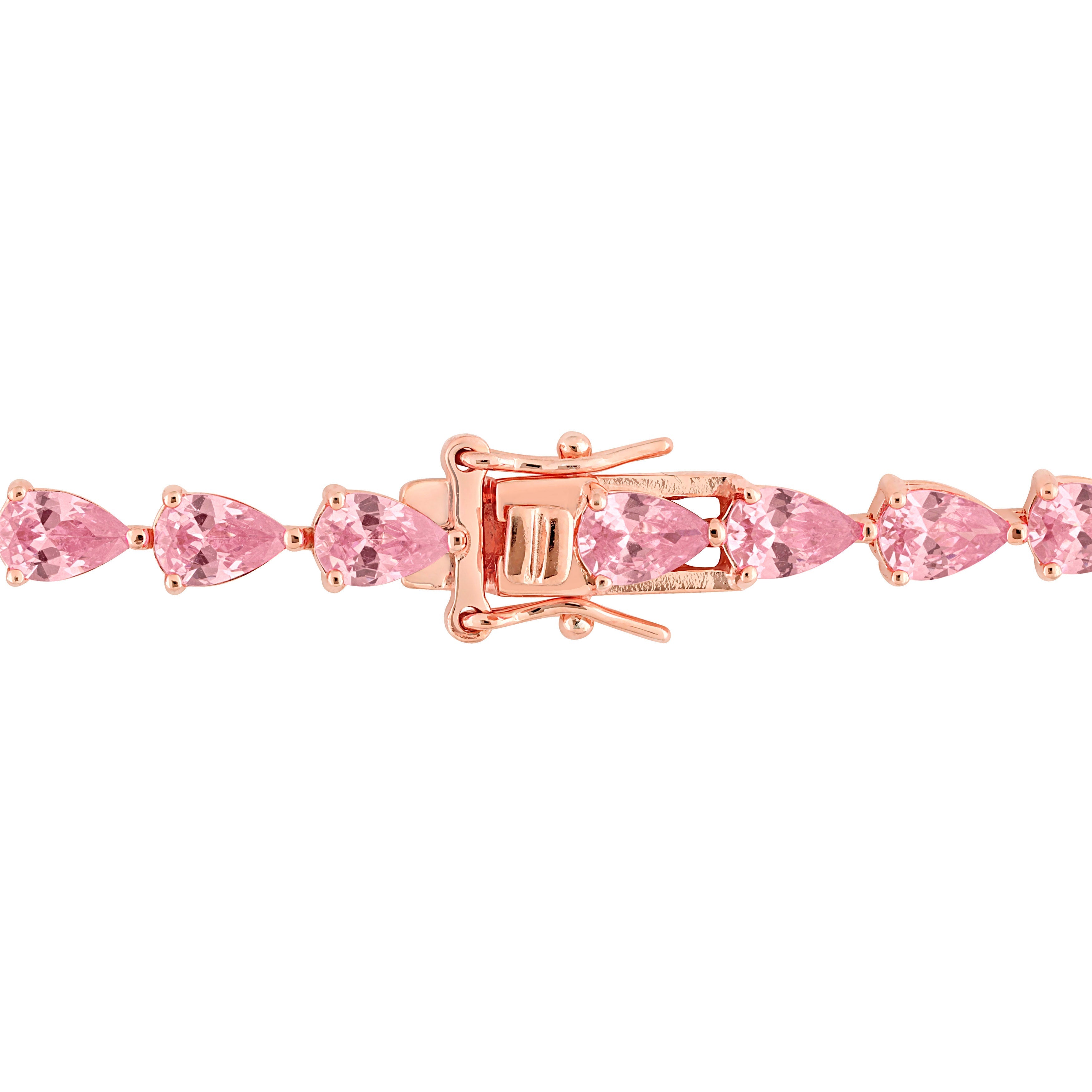 Rose-plated silver tennis bracelet with pear-cut pink sapphires, box clasp detail by Lord & Taylor