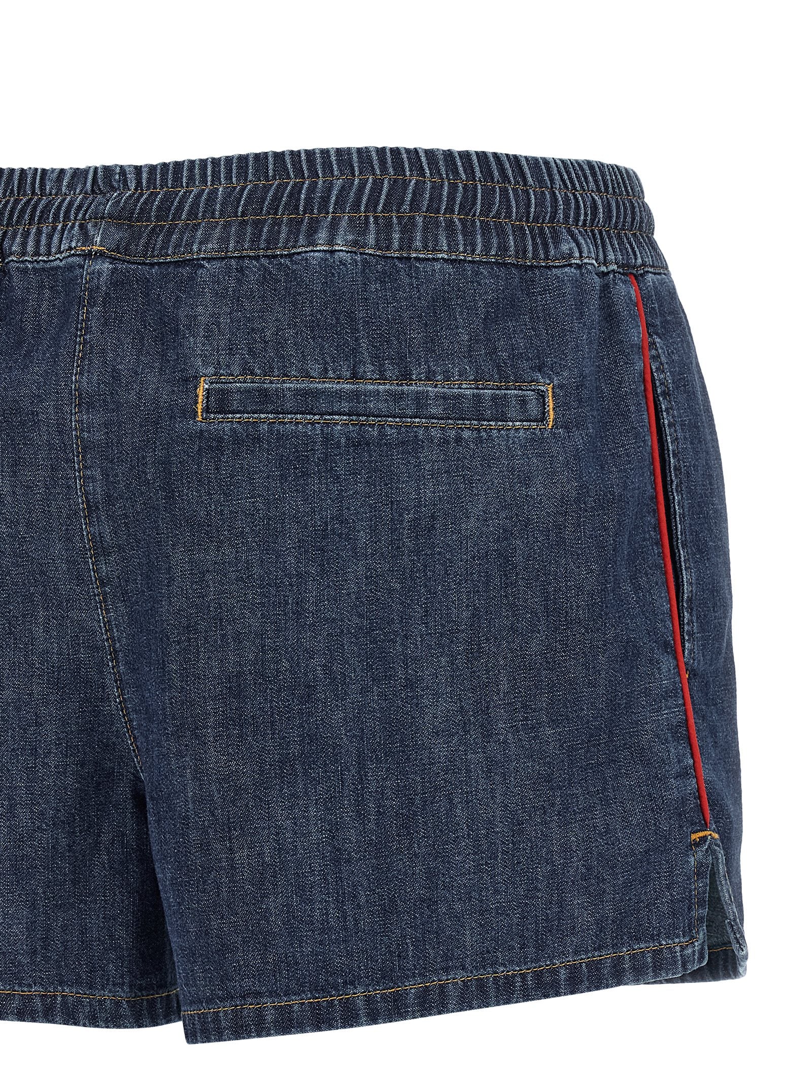Blue chambray denim shorts showing welt pockets and drawstring, detail view by Valentino Garavani