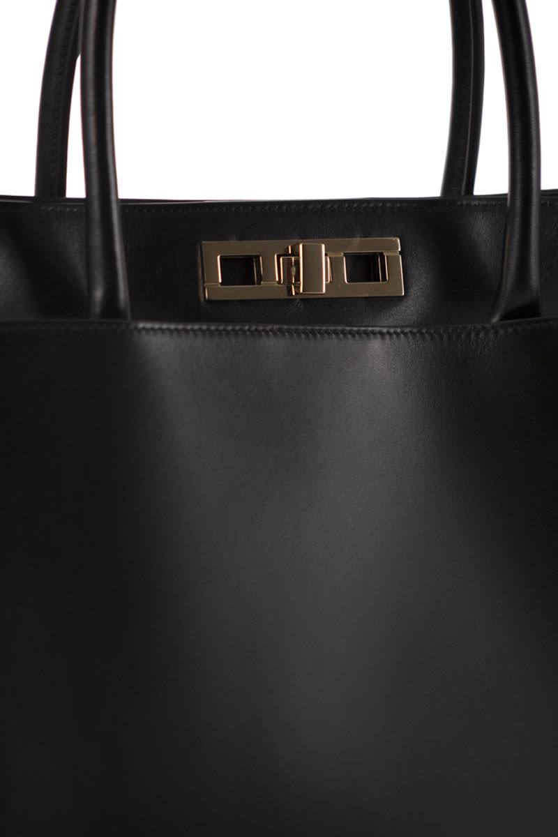 LARGE HANDBAG WITH METAL ACCESSORY Fabiana Filippi