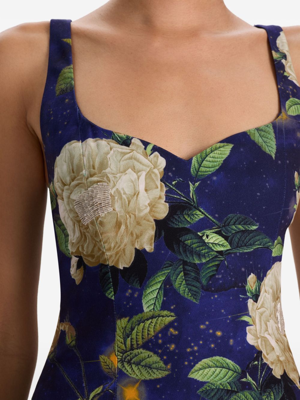 Blue floral mini dress with sweetheart neckline, back view by Alice + Olivia