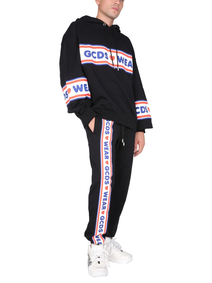 JOGGING PANTS WITH CUTE TAPE LOGO BAND GCDS