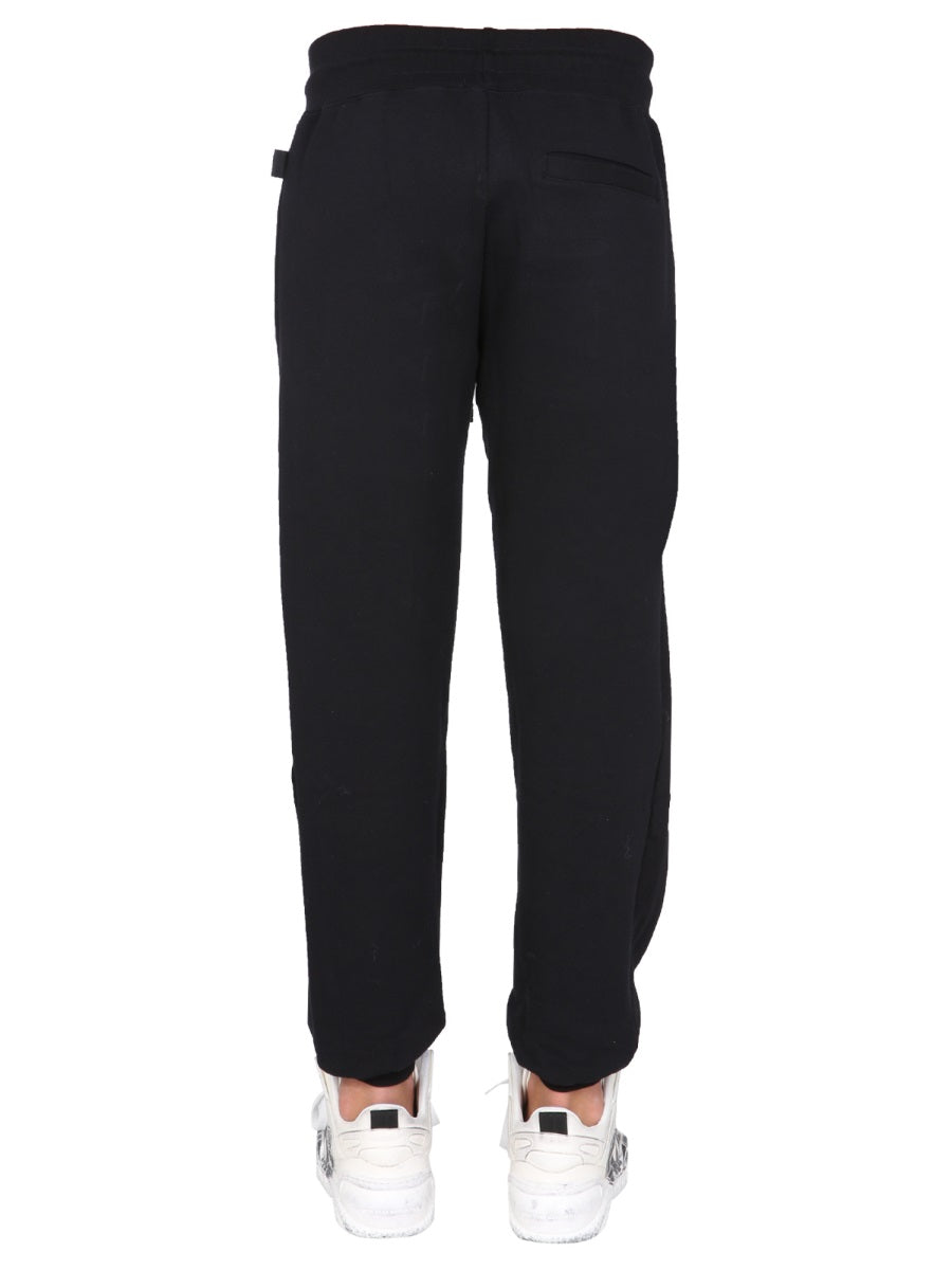 JOGGING PANTS WITH CUTE TAPE LOGO BAND GCDS