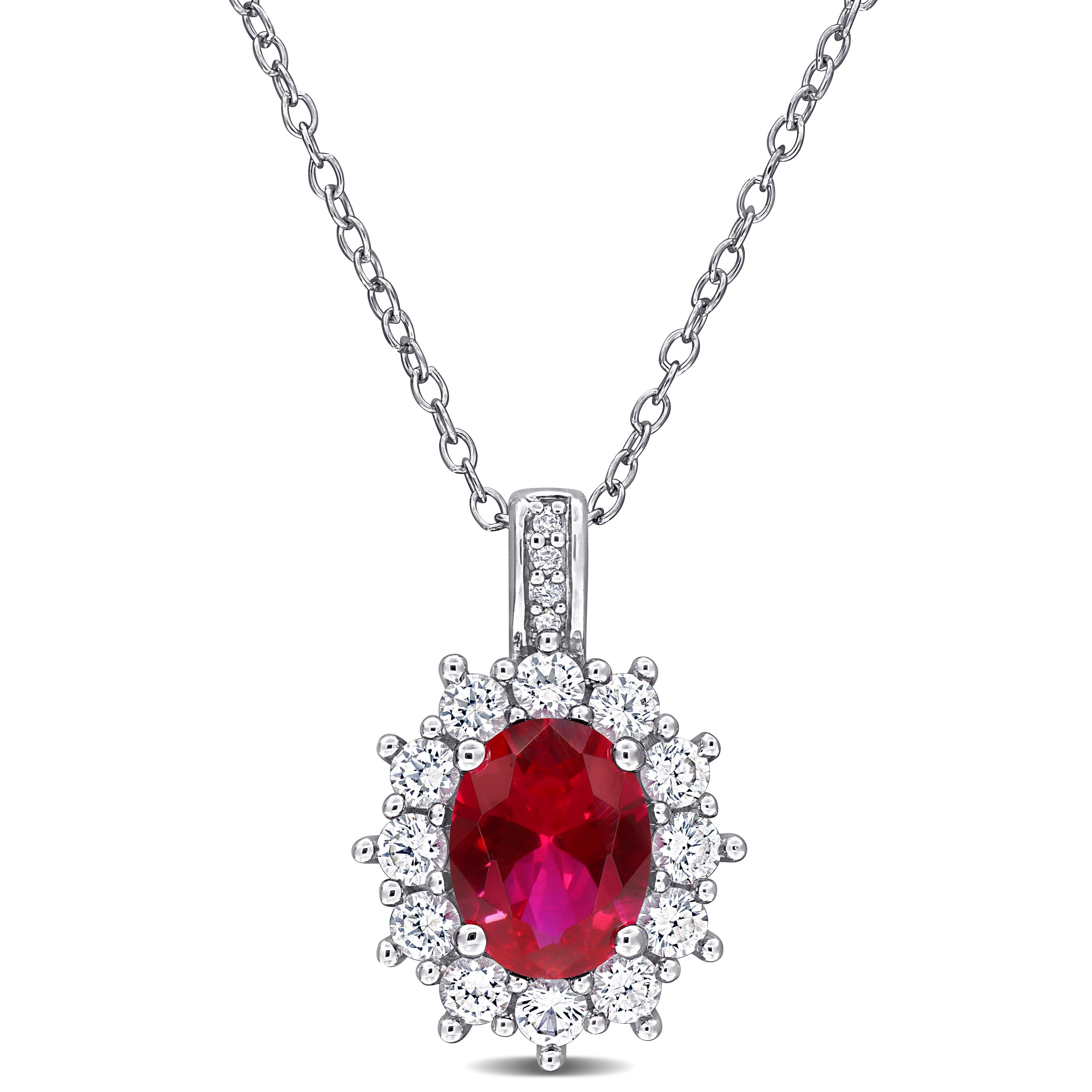Red ruby halo pendant necklace in sterling silver, front view by Delmar