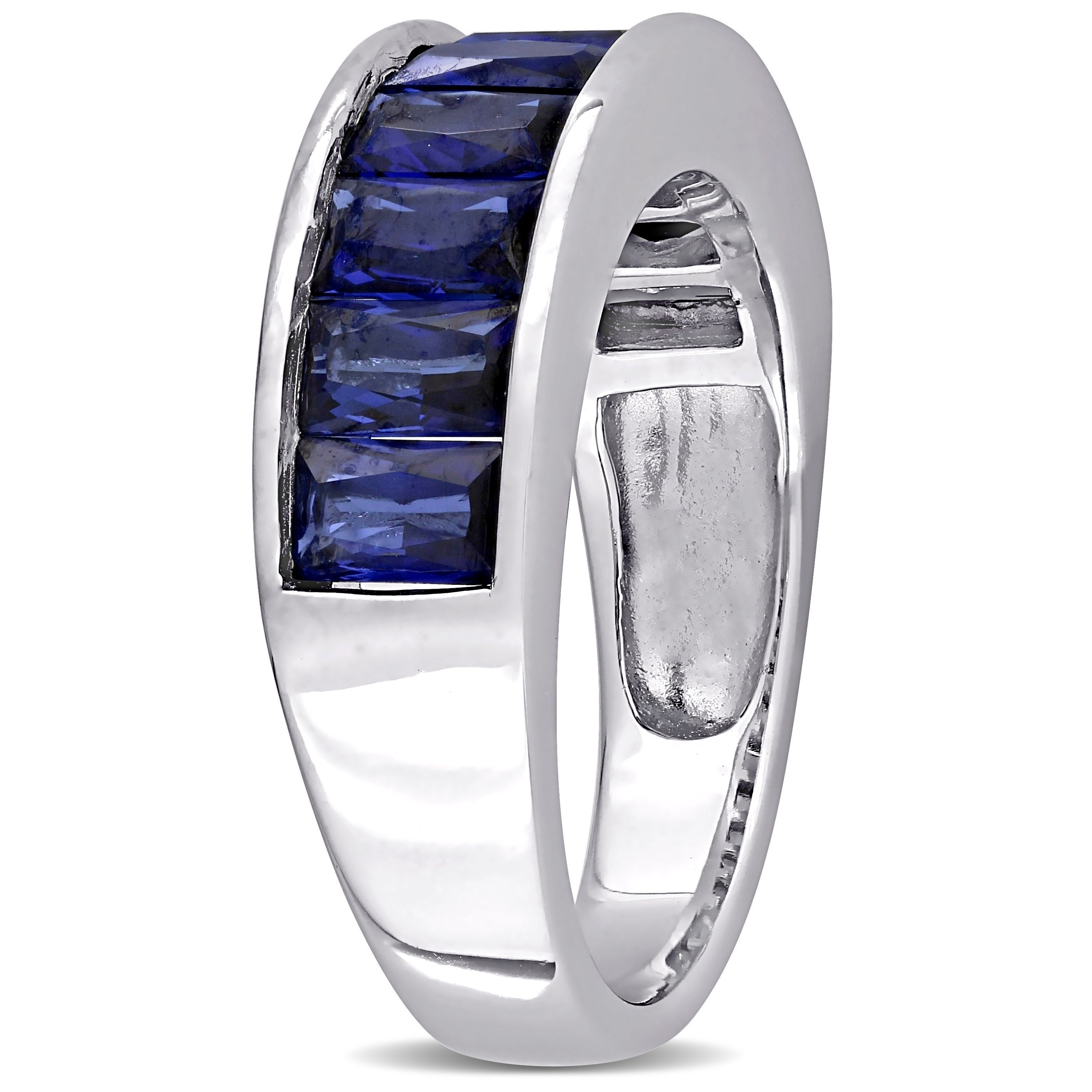 Blue sapphire anniversary band, side profile showing channel setting