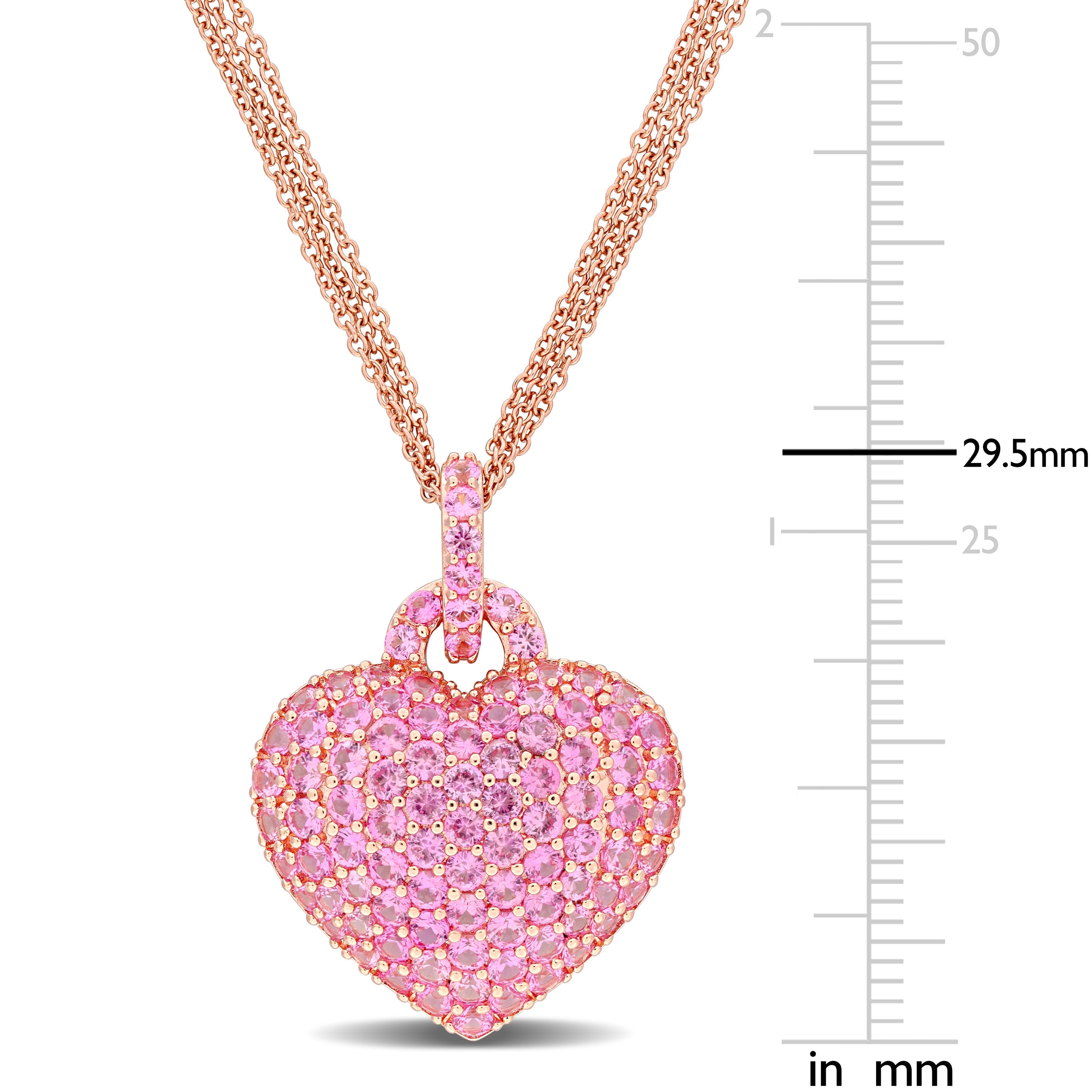 Close-up of created pink sapphire heart pendant in rose-plated silver by Lord & Taylor