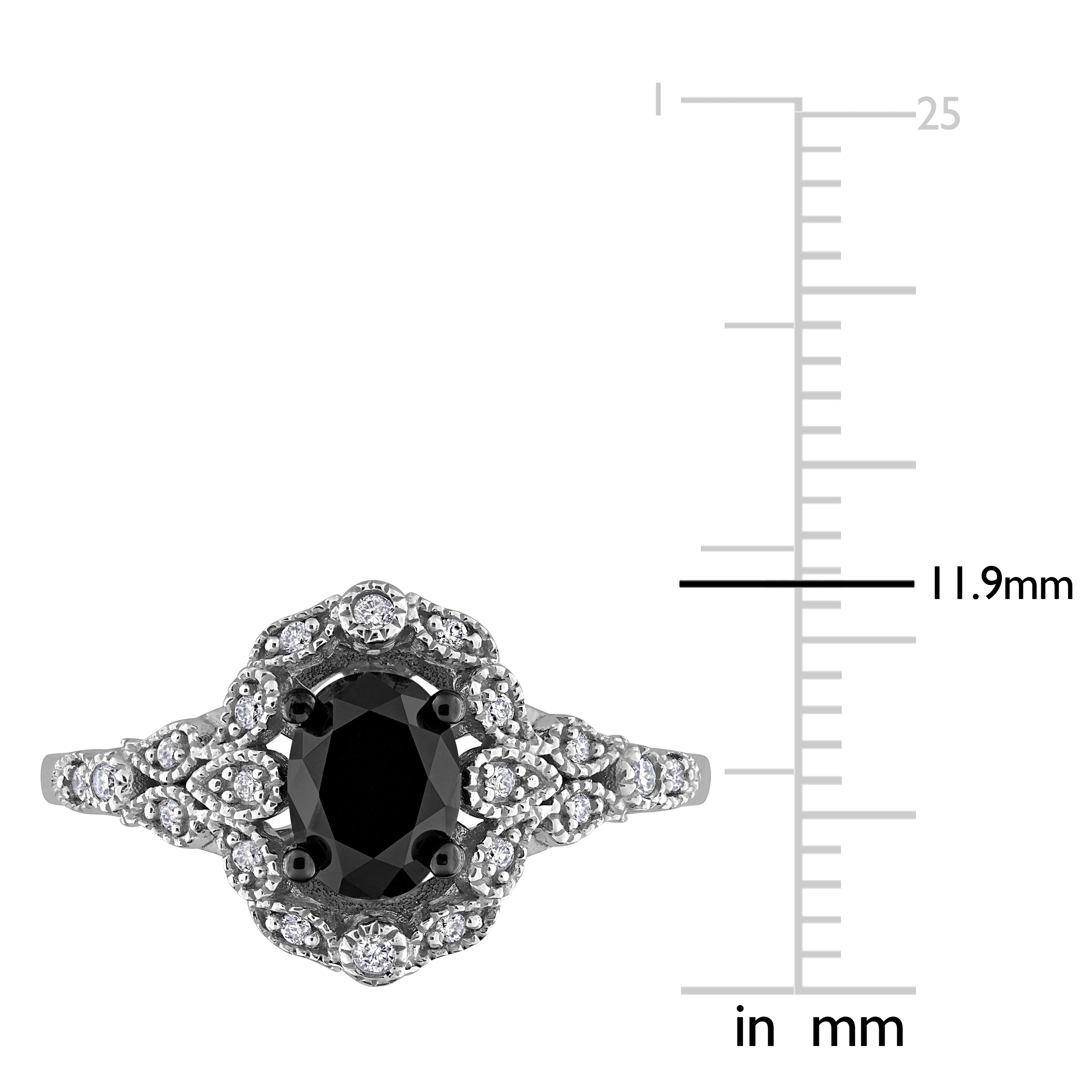 Close-up of oval black diamond center stone with pave-set white diamond halo