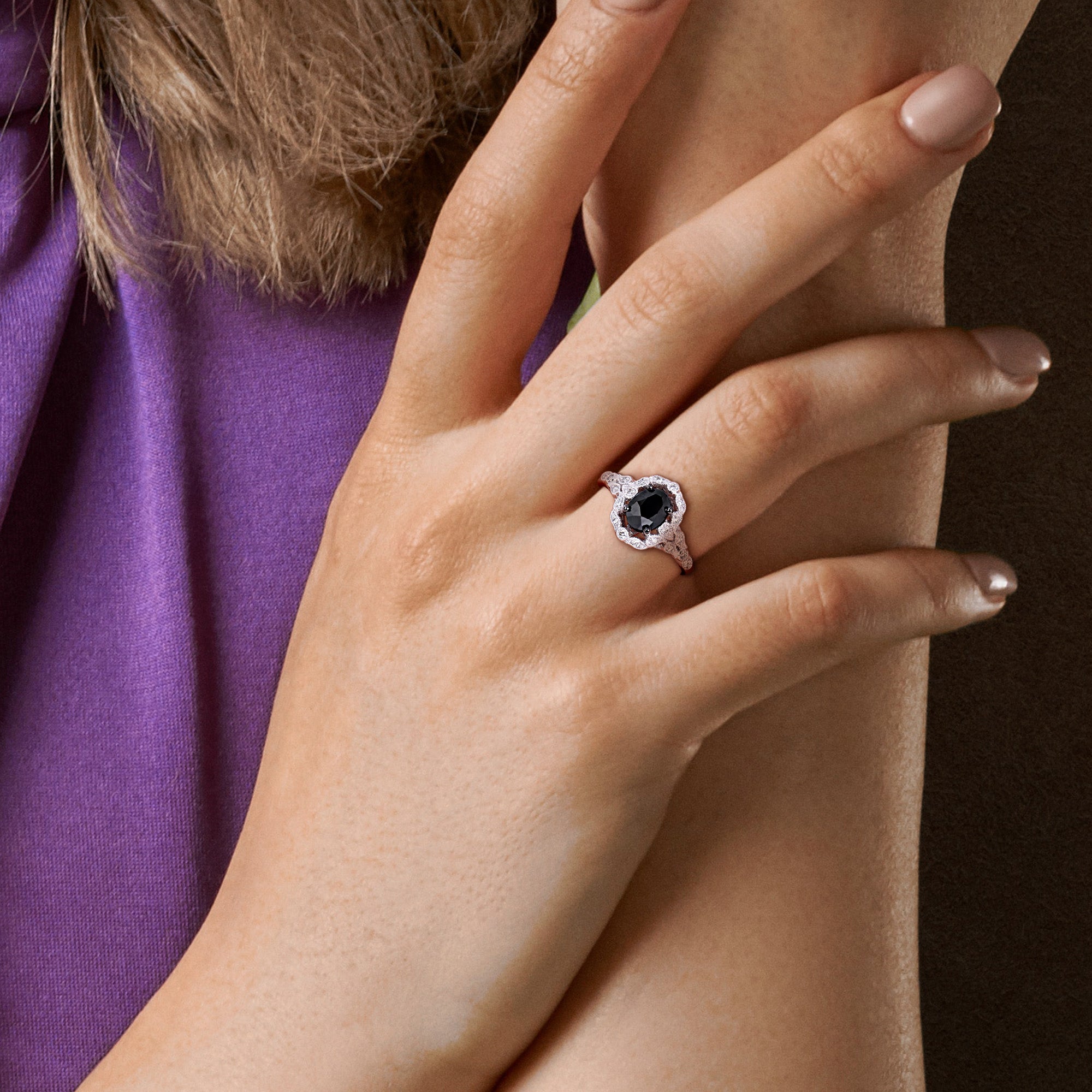 Lord & Taylor black diamond halo ring worn on hand, lifestyle view