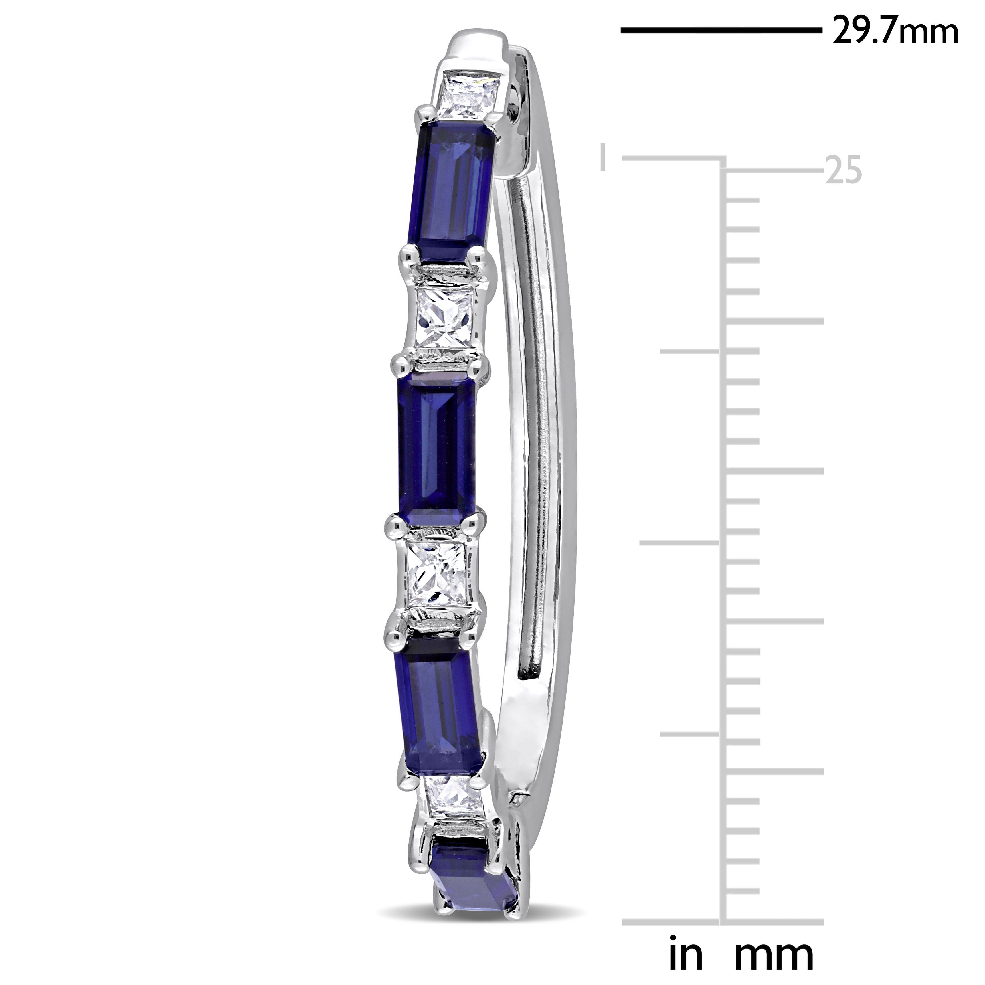 Close-up of baguette-cut blue sapphires and square-cut white sapphires on hoop earring by Lord & Taylor