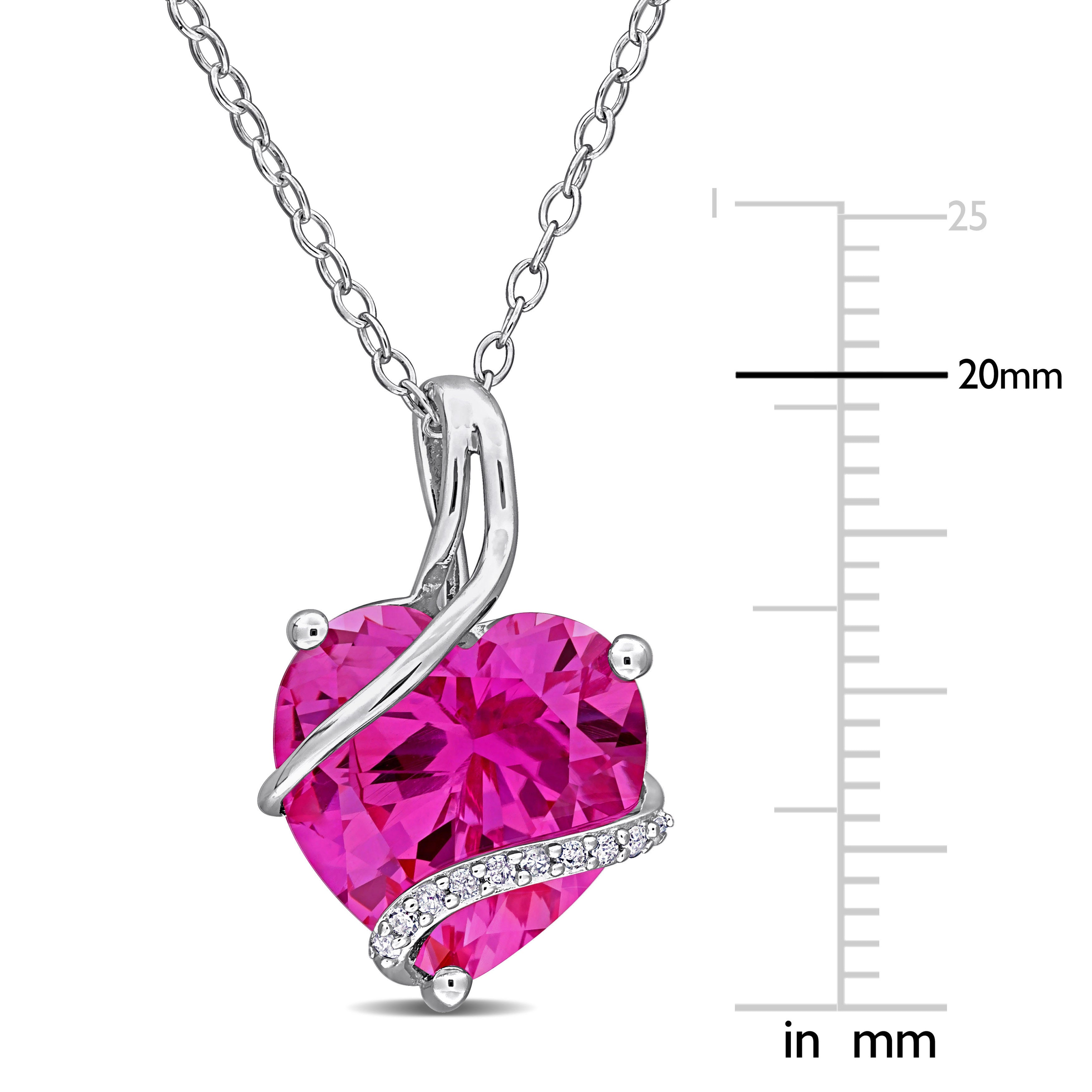 Pink sapphire heart pendant by Delmar, close-up of gemstone and setting