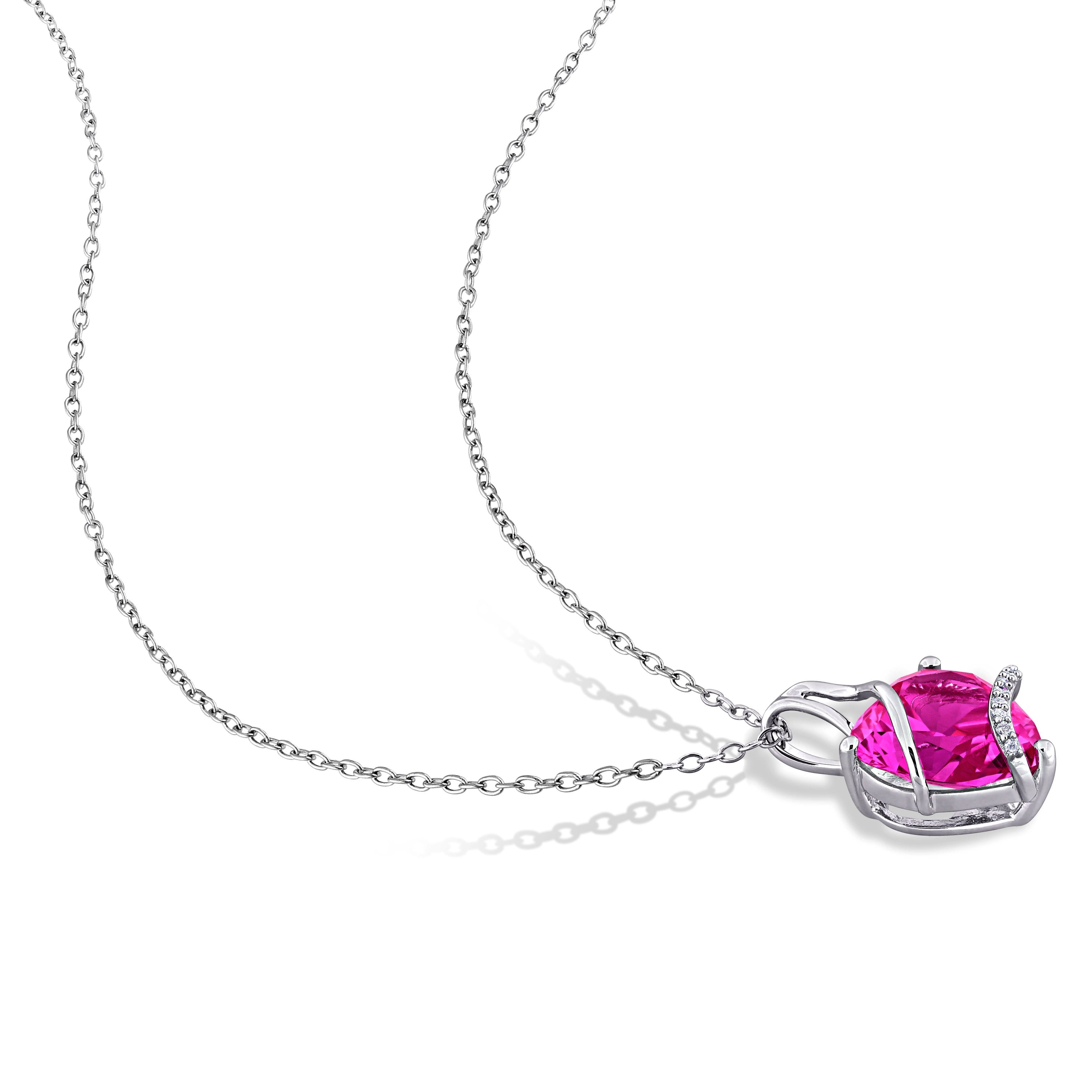 Pink sapphire heart pendant necklace by Delmar, detail of diamond accents