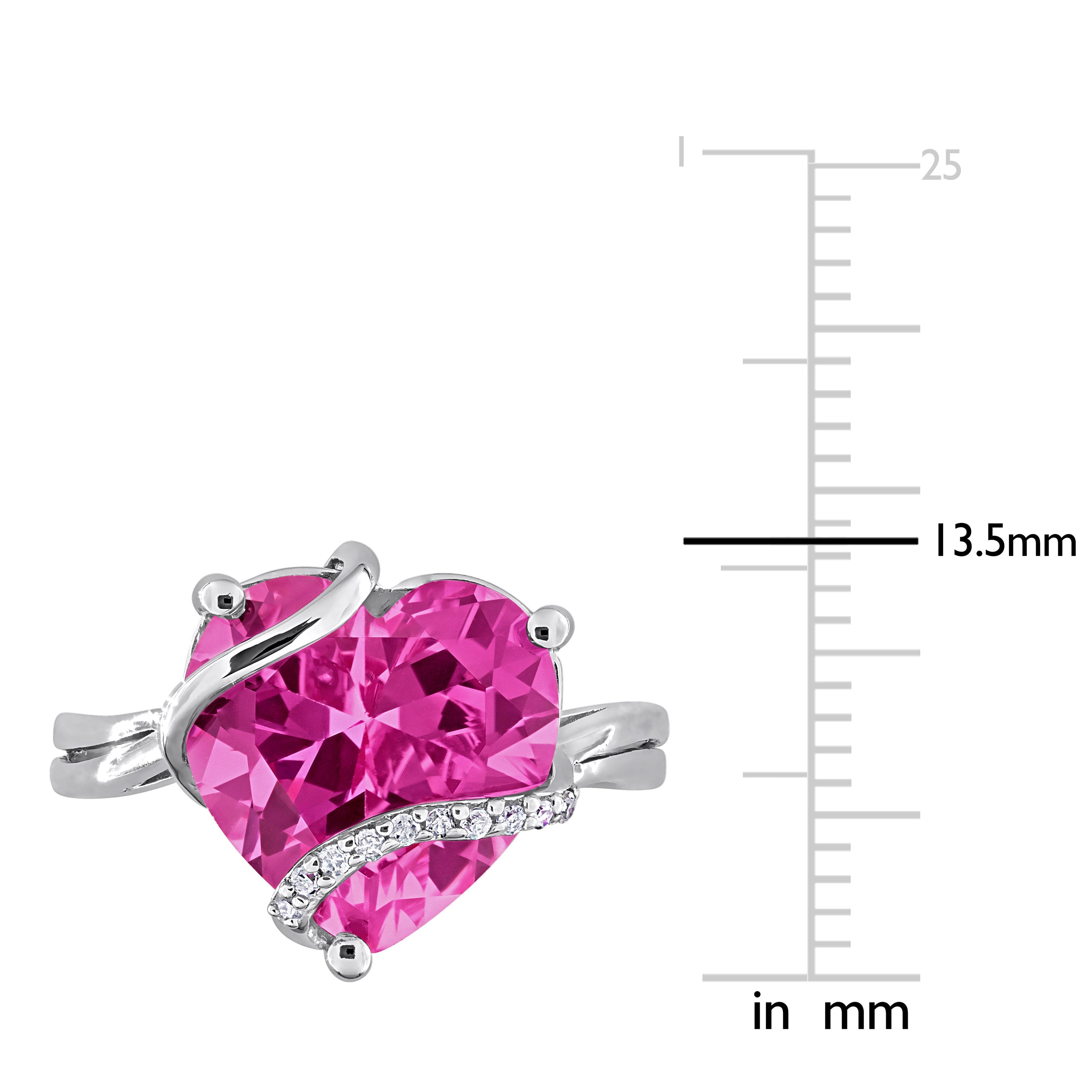 Heart-shaped pink sapphire with diamond accents by Delmar, close-up detail