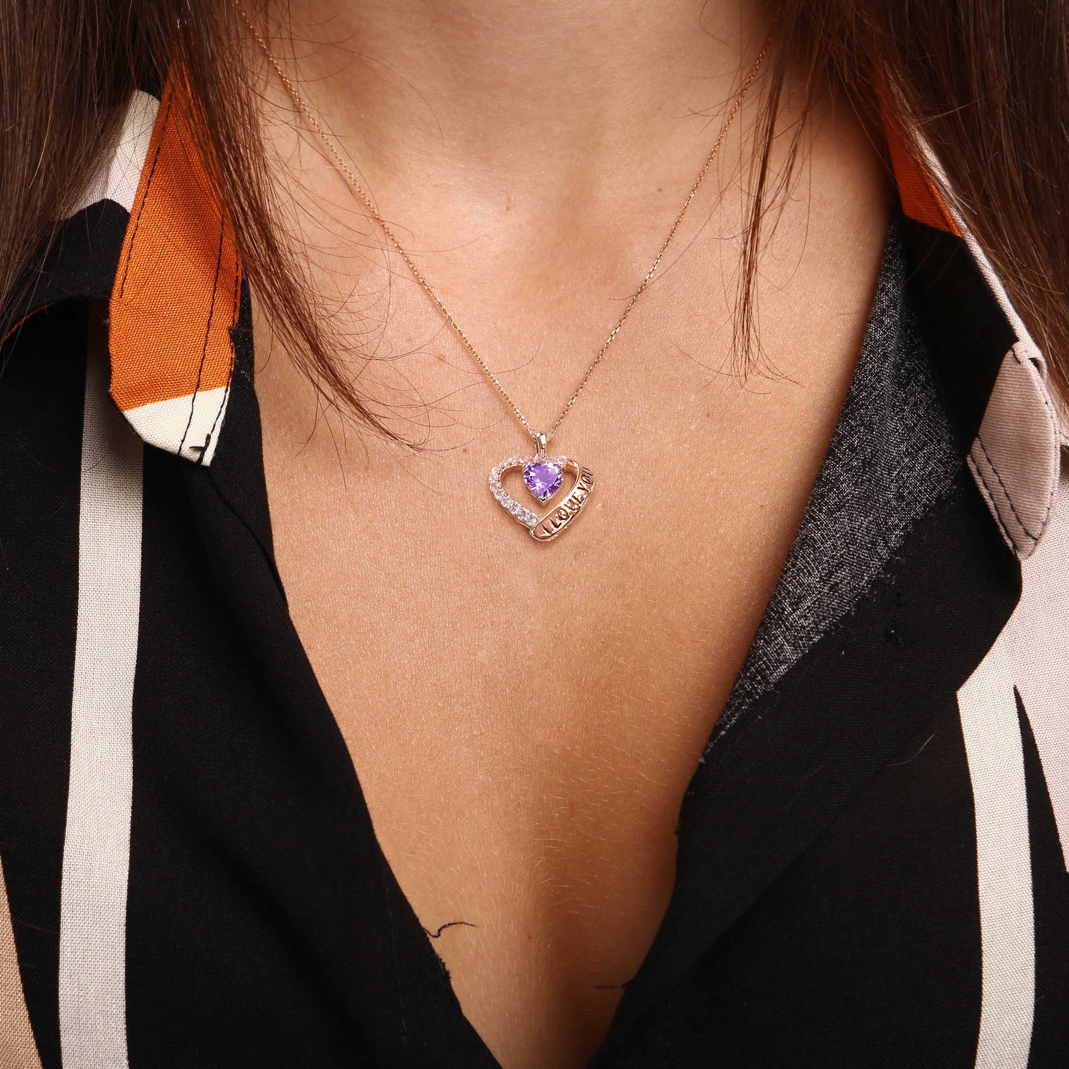 Rose gold plated amethyst heart pendant necklace by Delmar worn on model