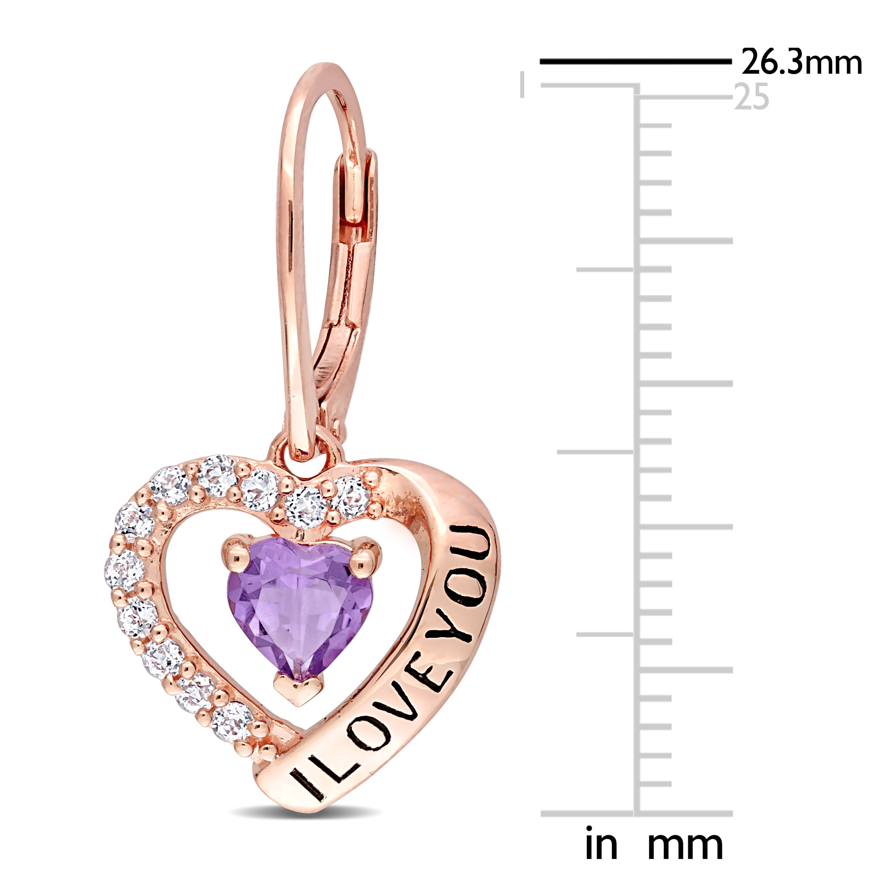 Close-up of heart-cut amethyst gemstone with white topaz halo and 'I Love You' engraving detail