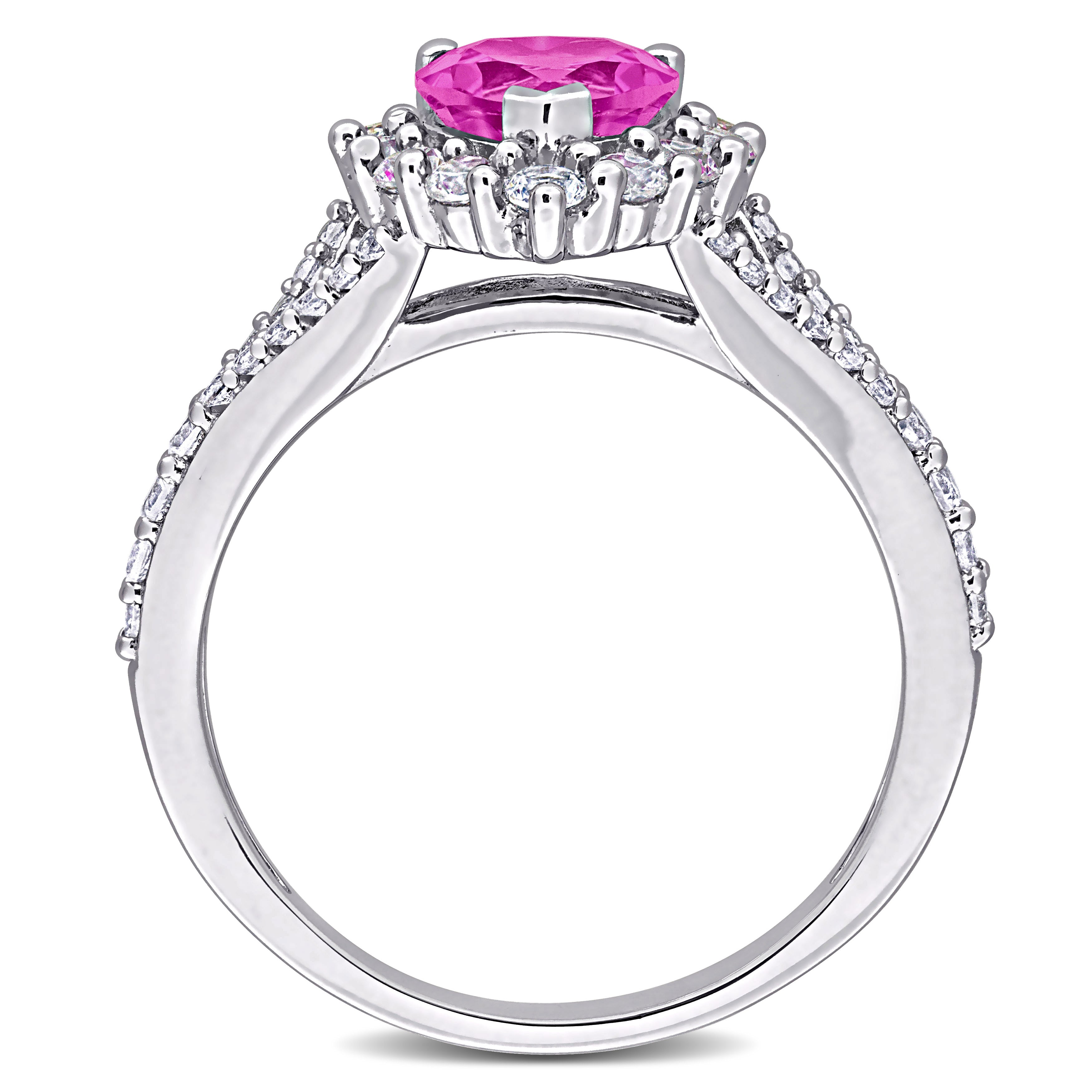 Pink sapphire heart halo ring in sterling silver by Delmar, diagonal view