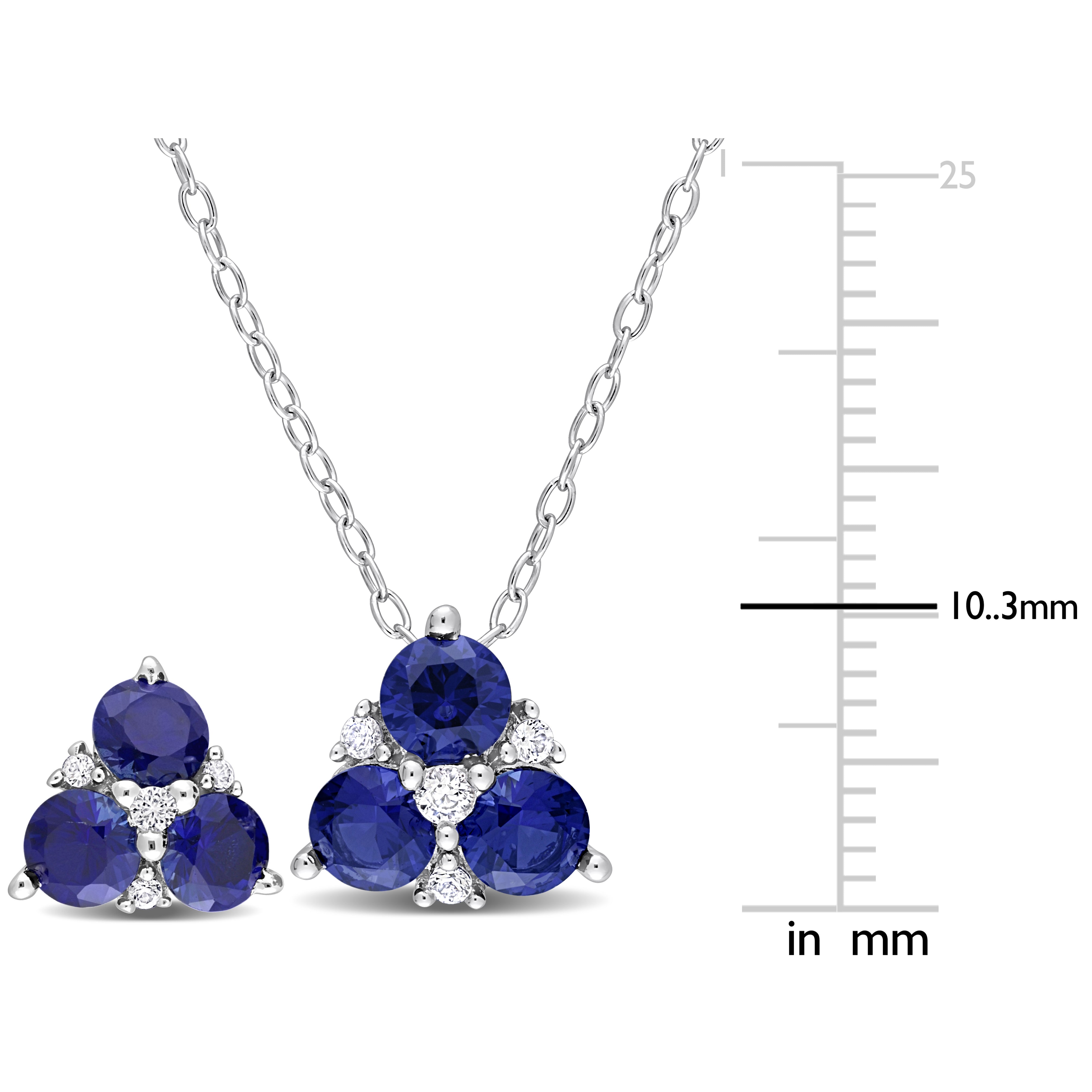 Three-stone gemstone pendant with prong settings, close-up detail by Lord & Taylor