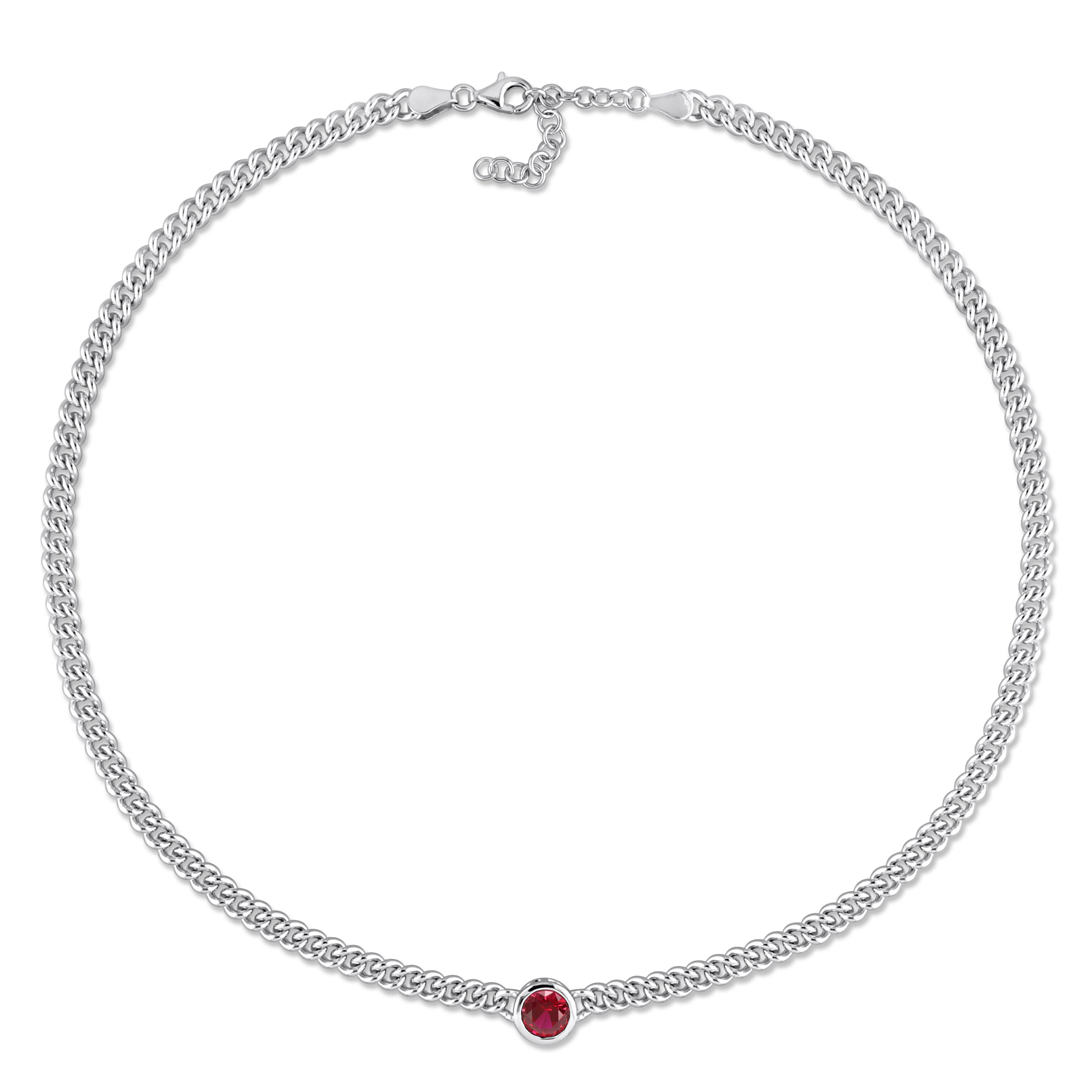 Round-cut created ruby in bezel setting on sterling silver chain, detail view