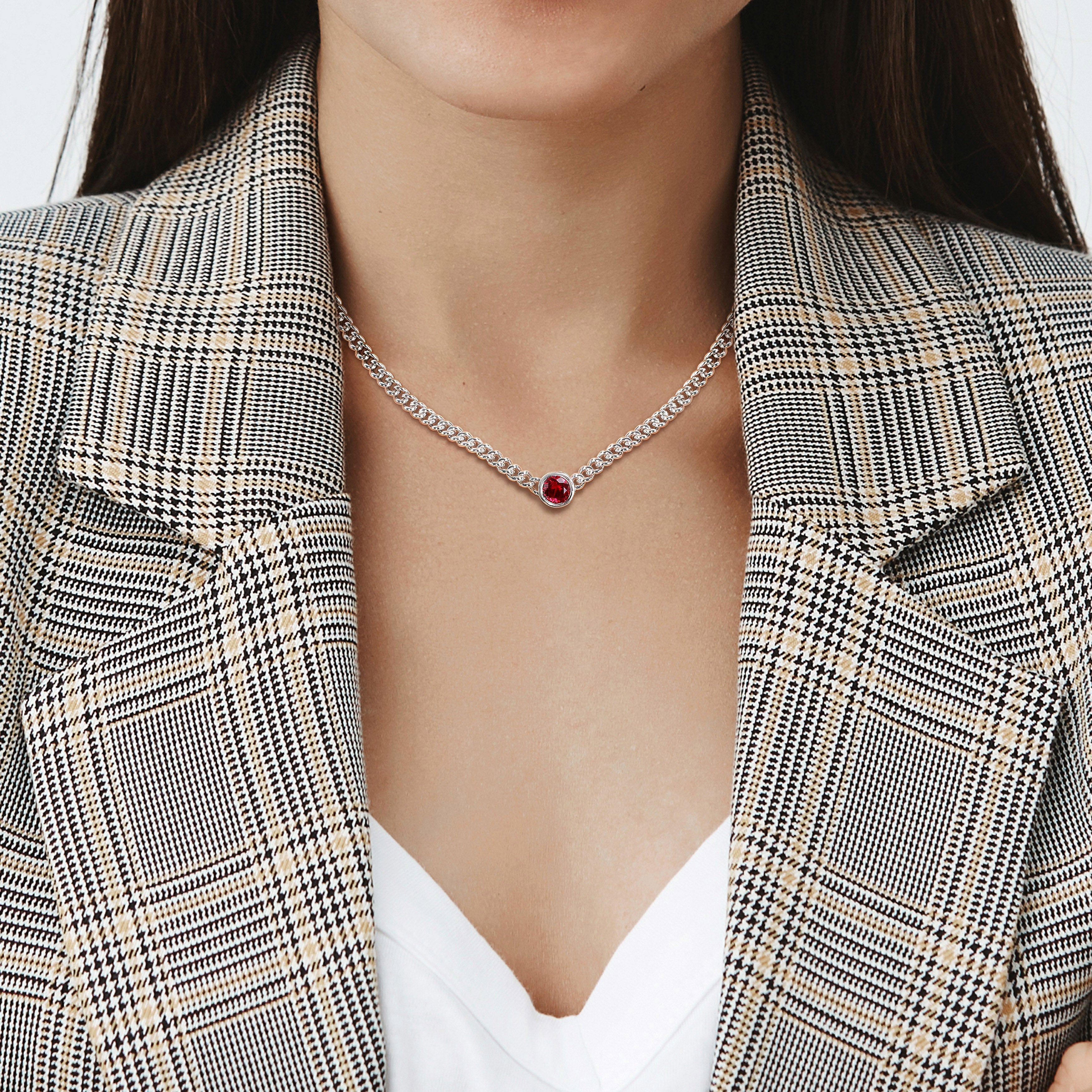 Sterling silver gemstone necklace with created ruby worn on model