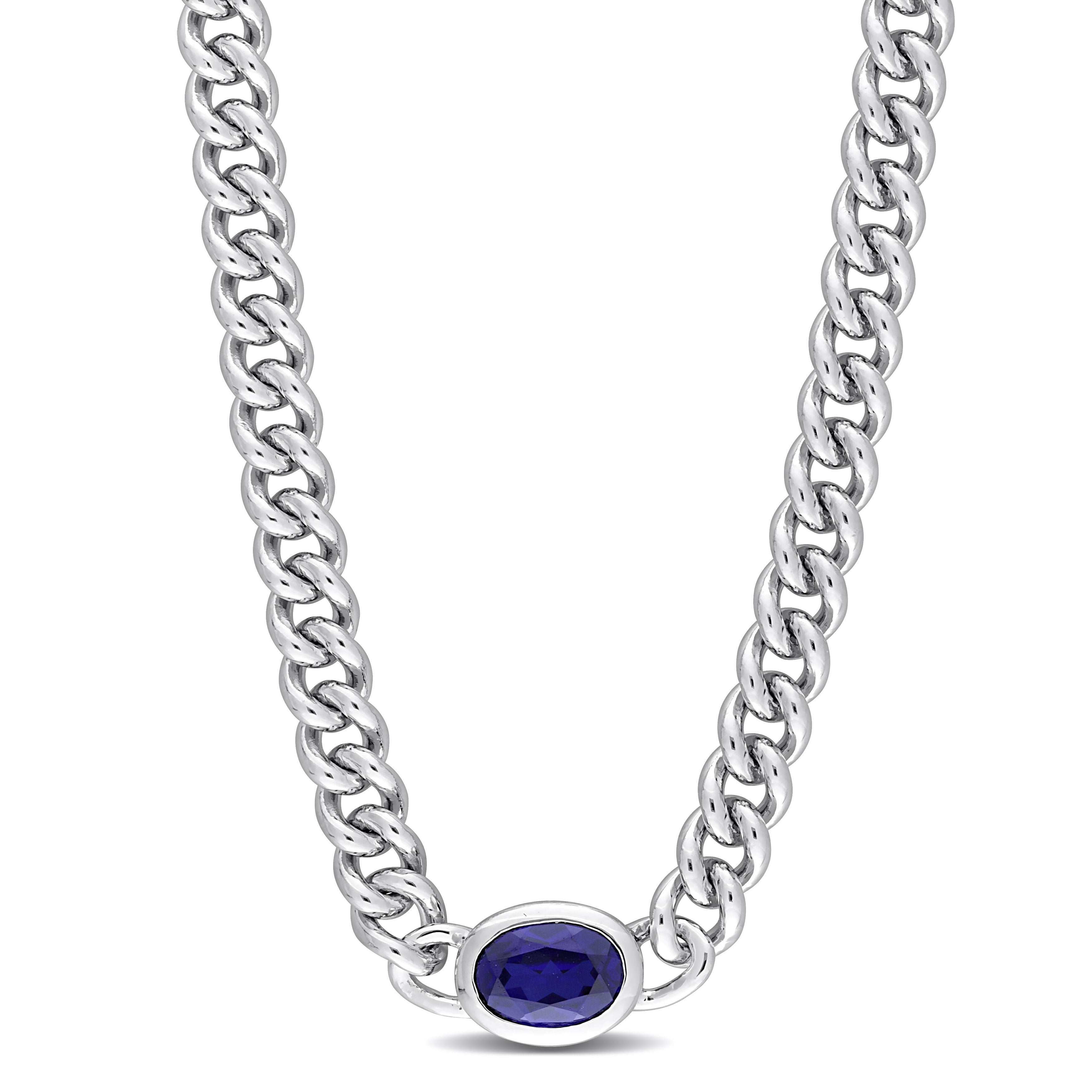 Blue sapphire pendant necklace on sterling silver curb chain by Delmar, front view