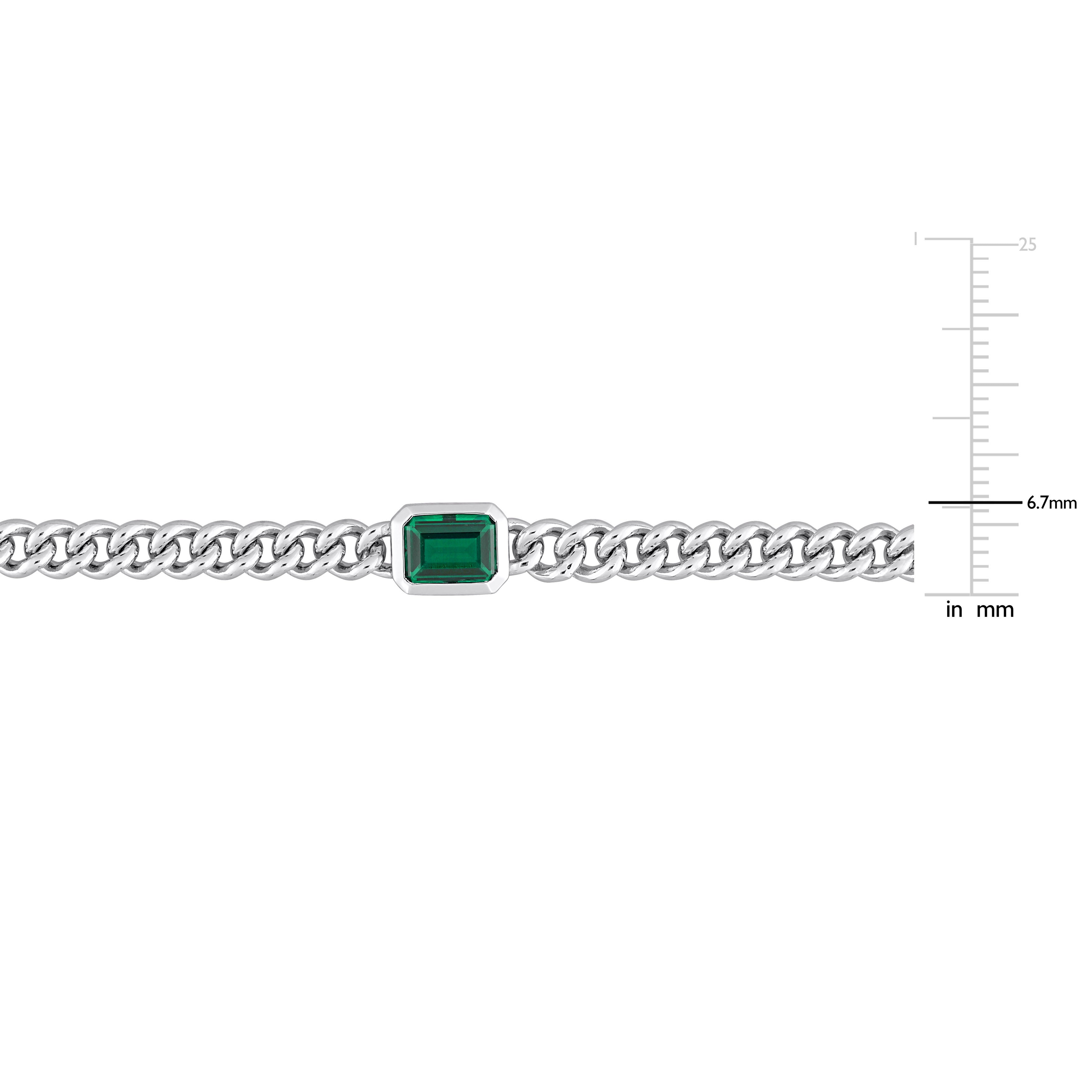 Octagon created emerald gemstone in bezel setting, close-up detail by Lord & Taylor