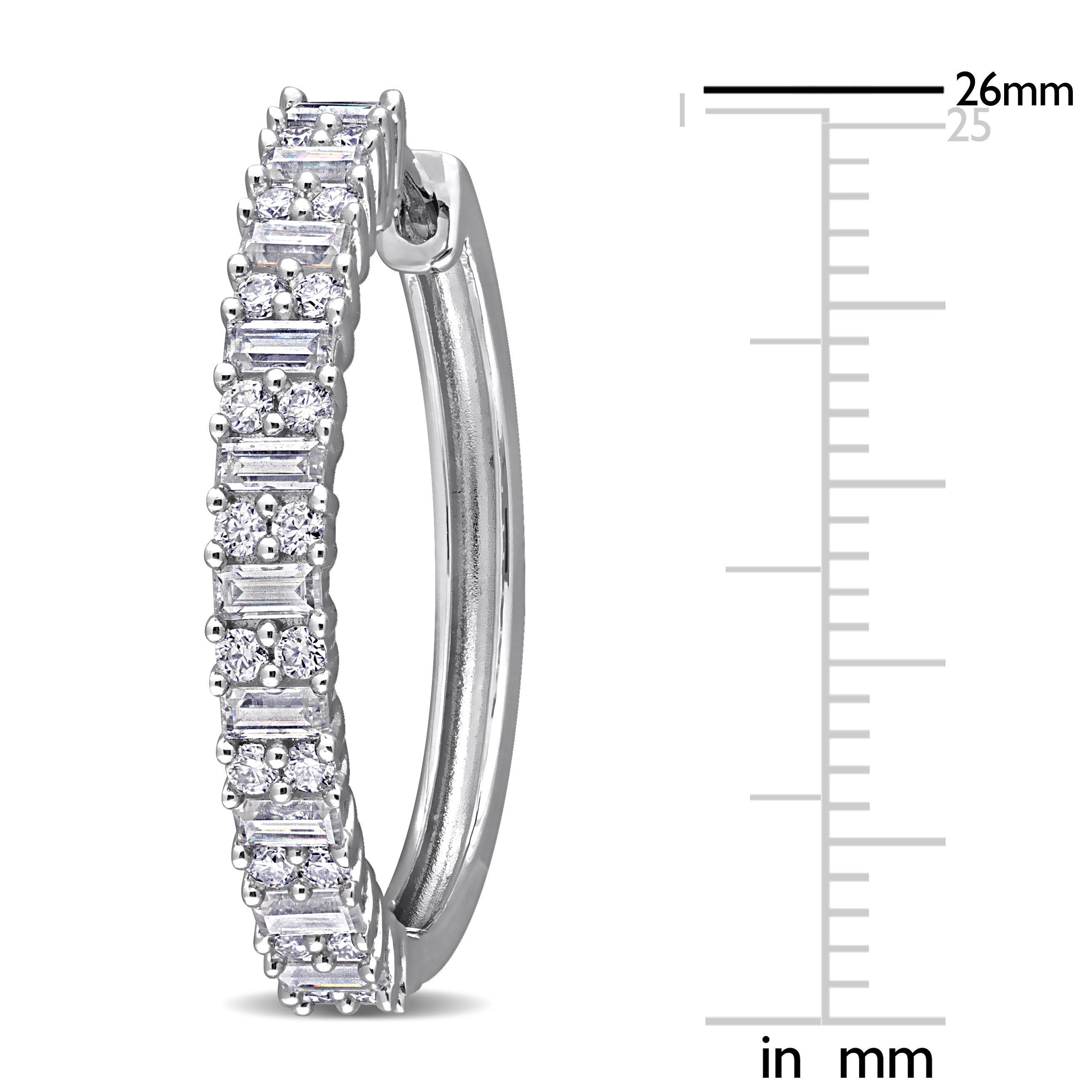 Close-up of baguette and round-cut moissanite stones in sterling silver hoop earring by Delmar