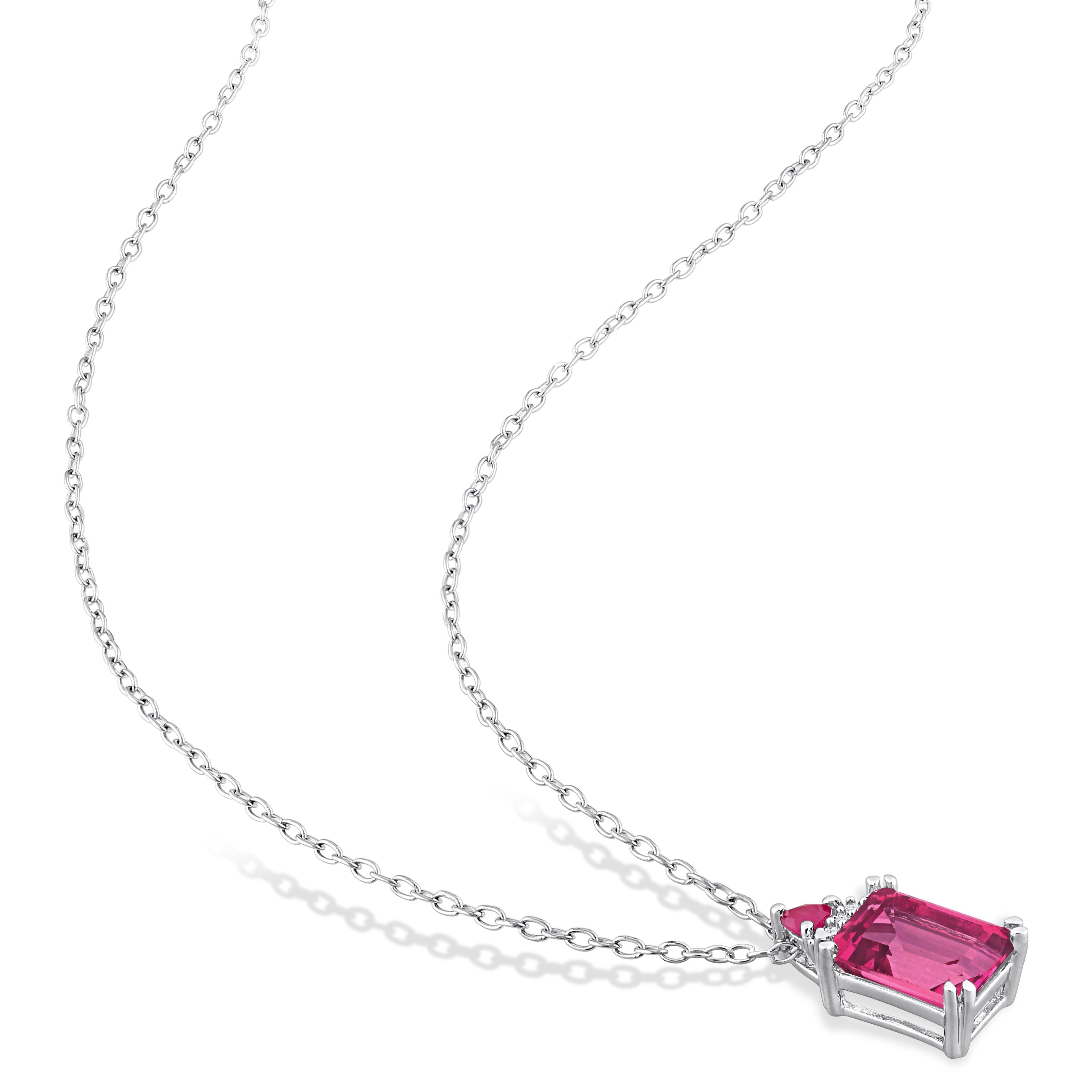 Sterling silver pendant necklace with pink topaz and ruby, detail view of gemstones