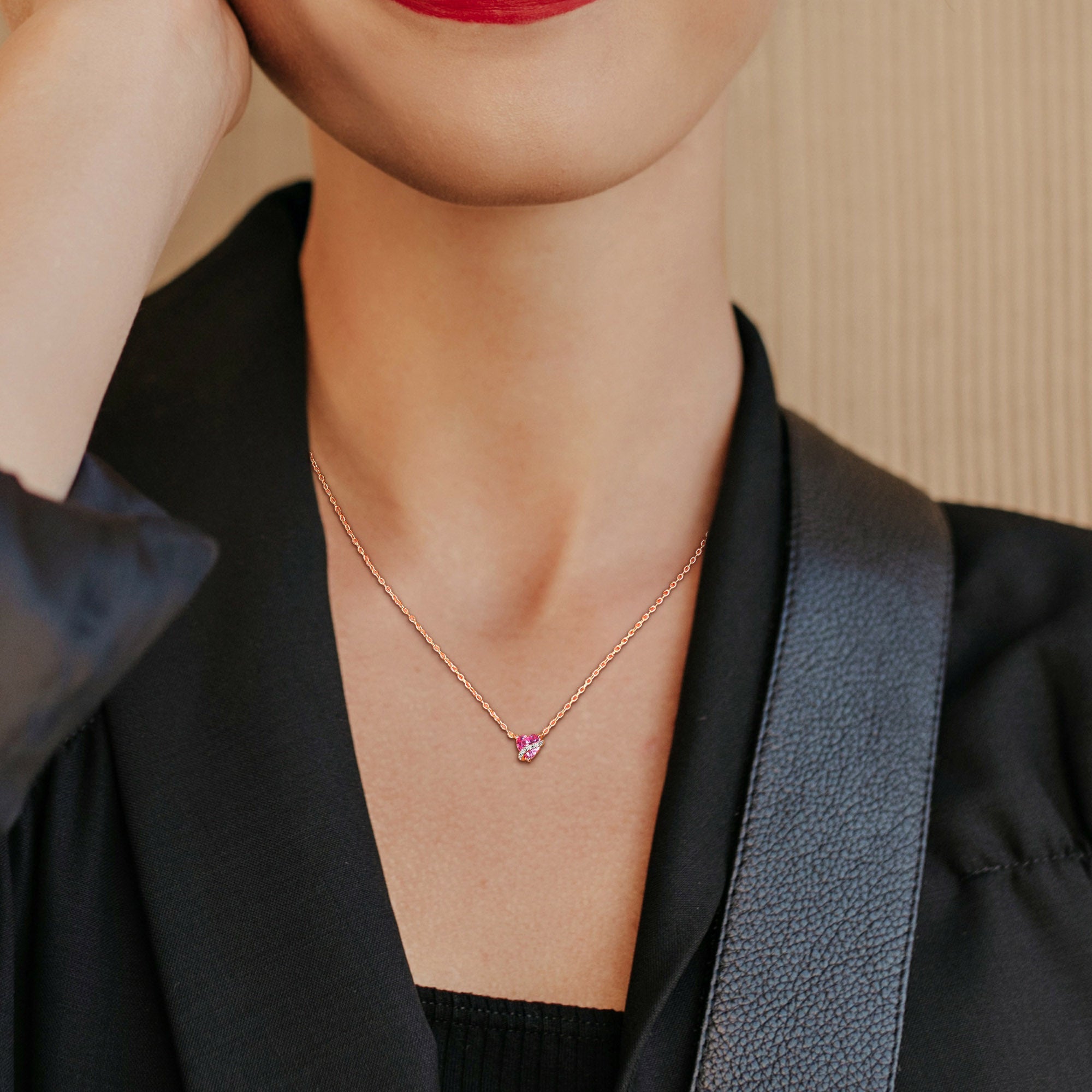 Rose-plated heart pendant necklace worn, lifestyle view by Delmar