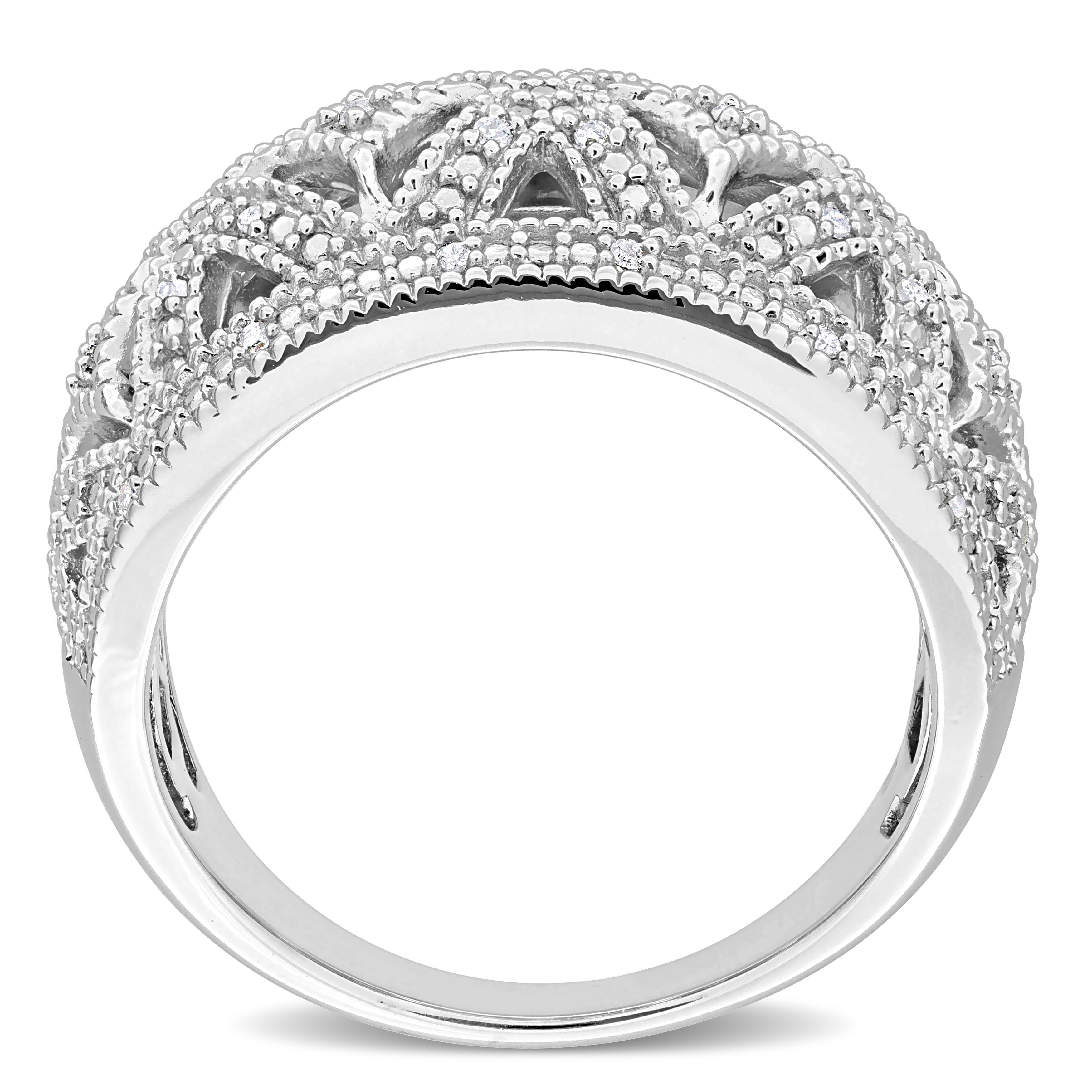 Round diamond detail on sterling silver ring, close-up view