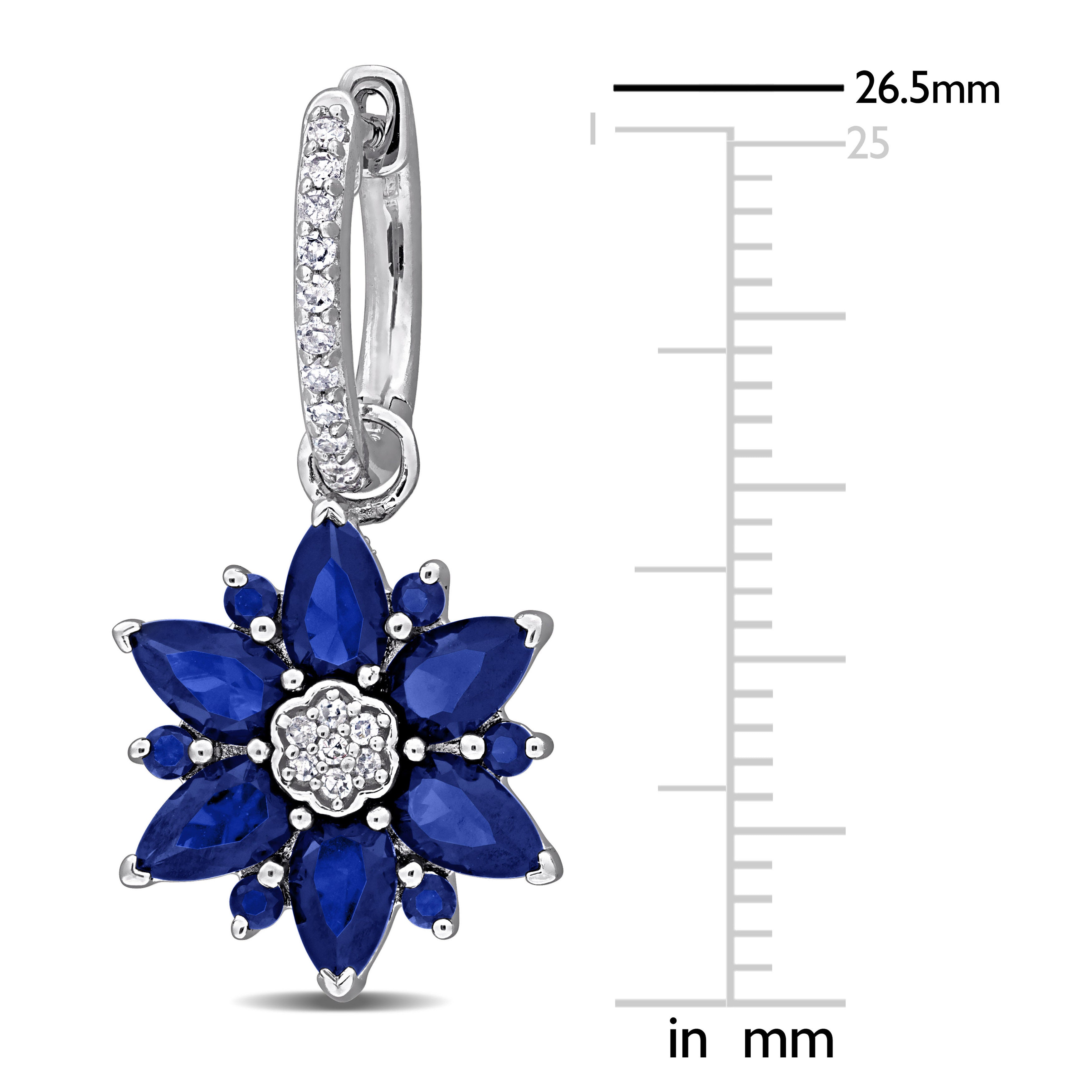 Close-up of created blue sapphire and diamond flower detail on hoop earring