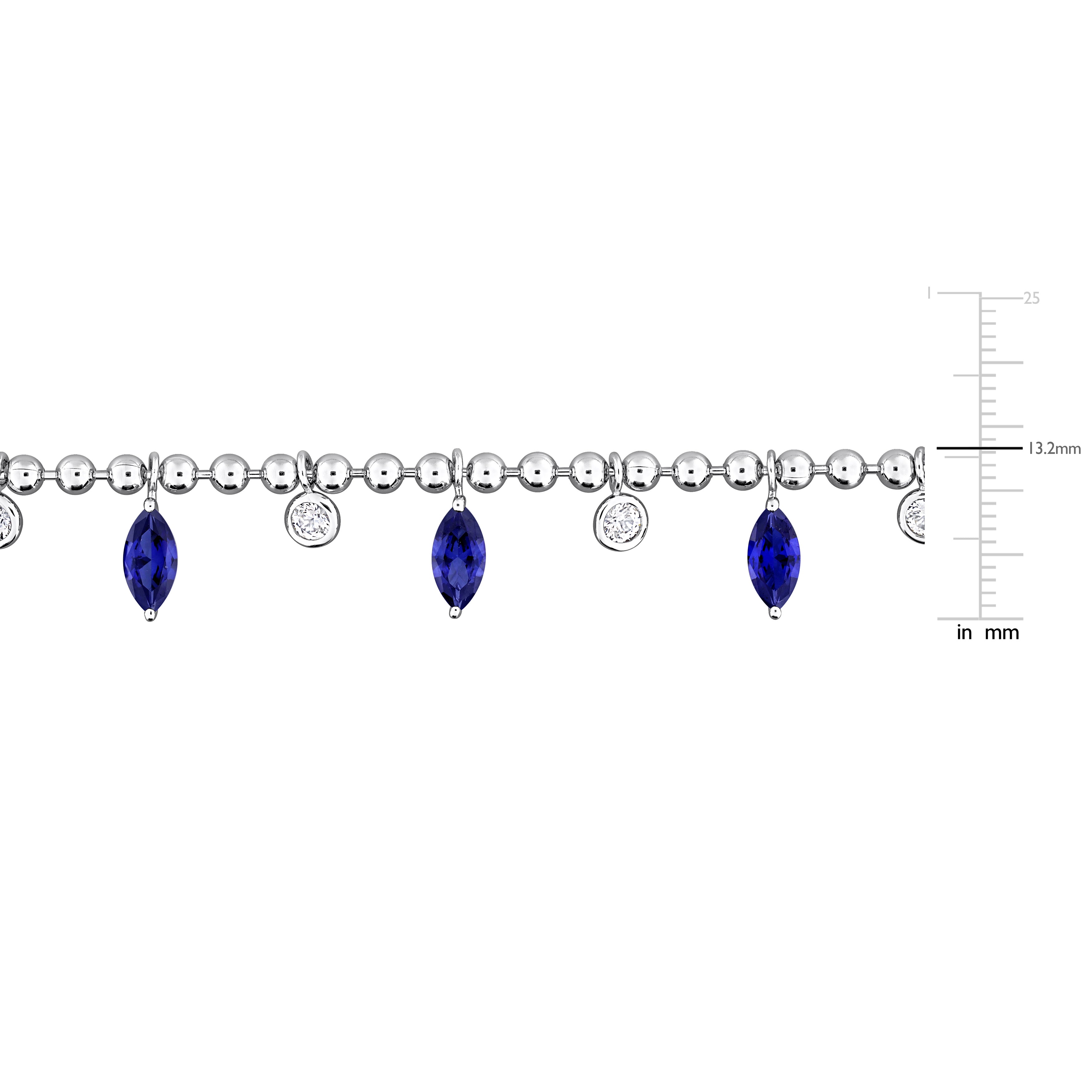 Detail view of created blue sapphire marquise stones and white sapphire accents by Lord & Taylor