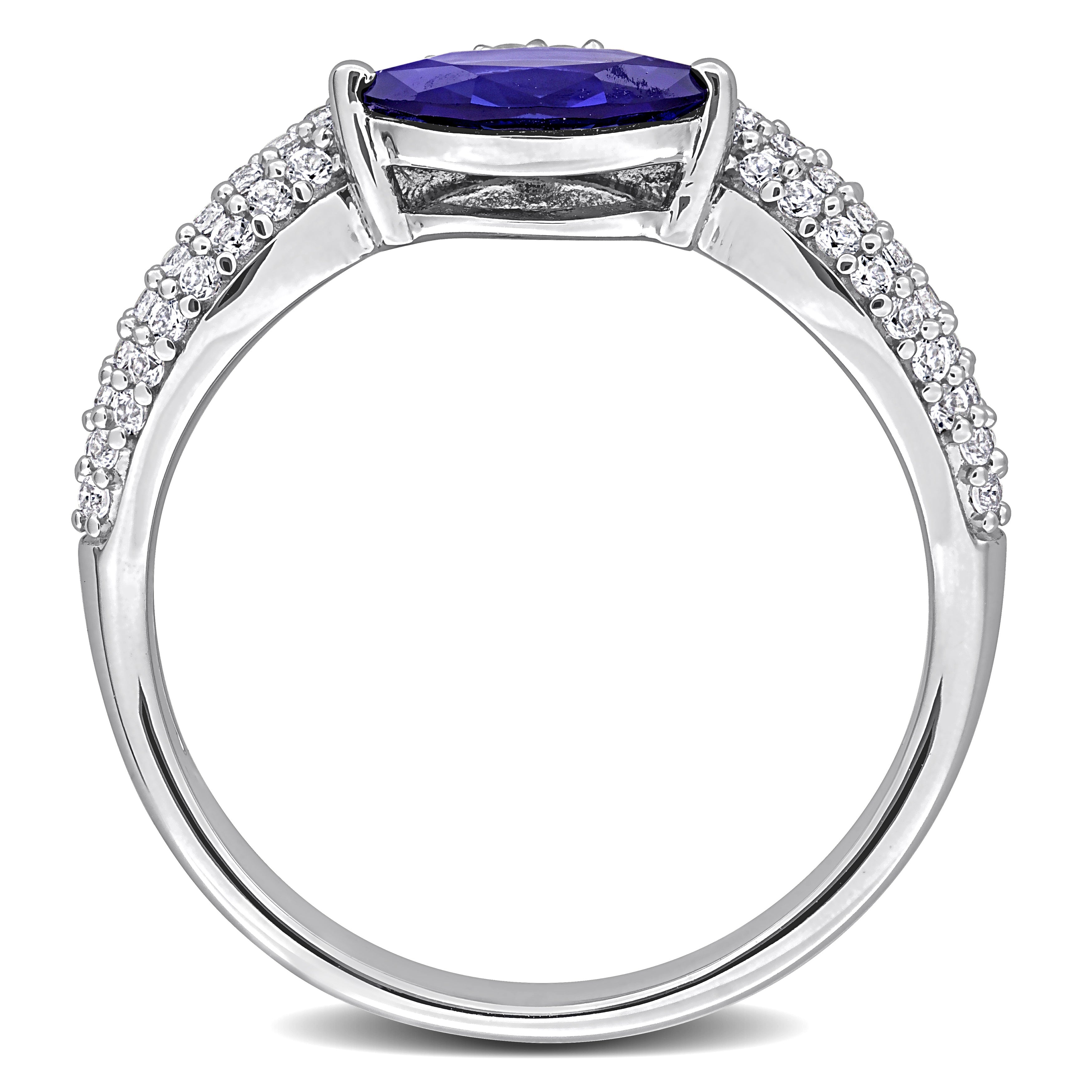 Blue sapphire curved ring in sterling silver, diagonal view by Lord & Taylor
